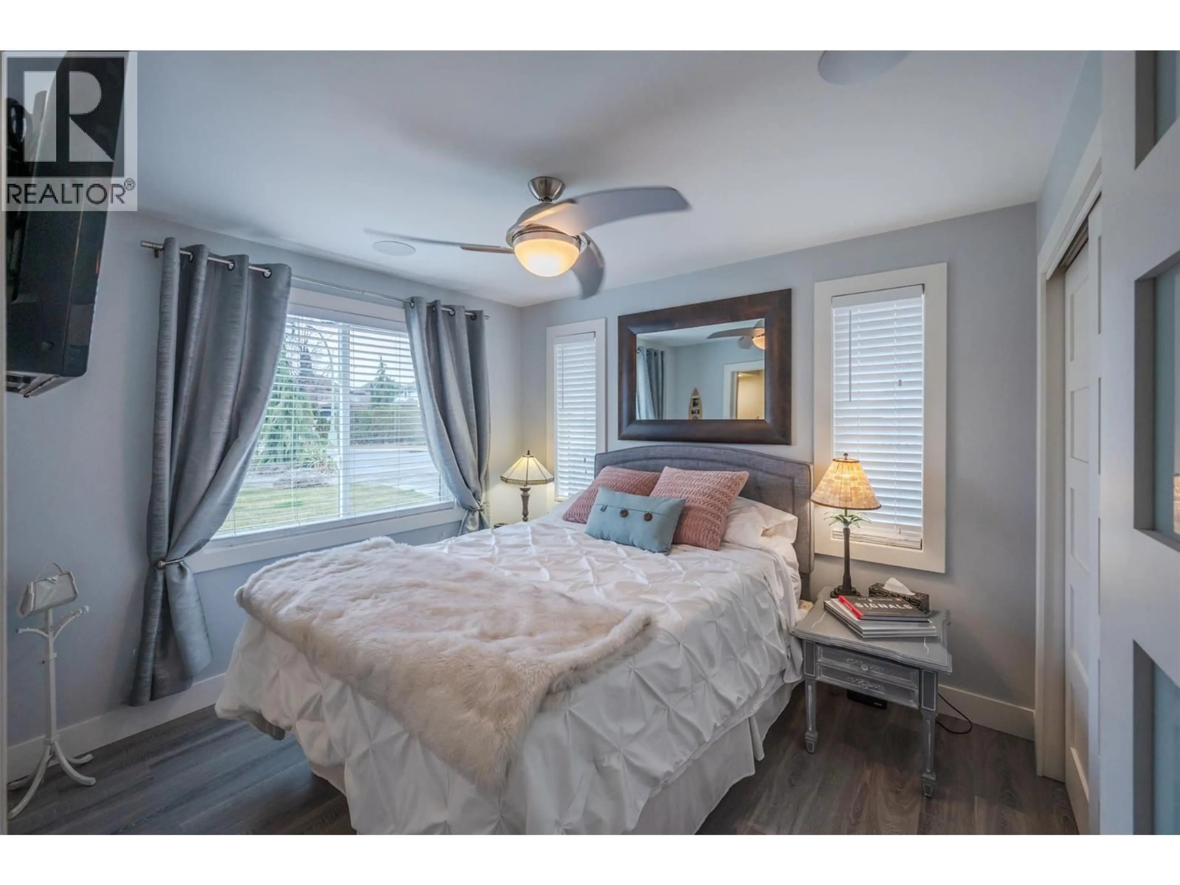 Bedroom with bed, wood/laminate floor for 1362 GREEN BAY ROAD, West Kelowna British Columbia V4T2B6