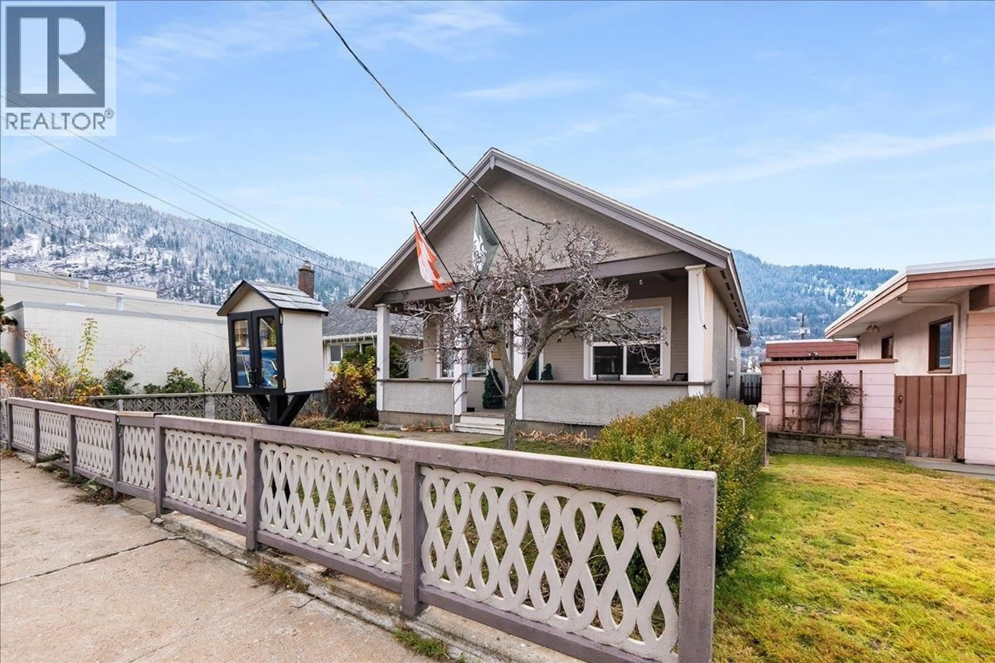 A pic from outside/outdoor area/front of a property/back of a property/a pic from drone, mountain view for 1570 THIRD AVENUE, Trail British Columbia V1R1P7