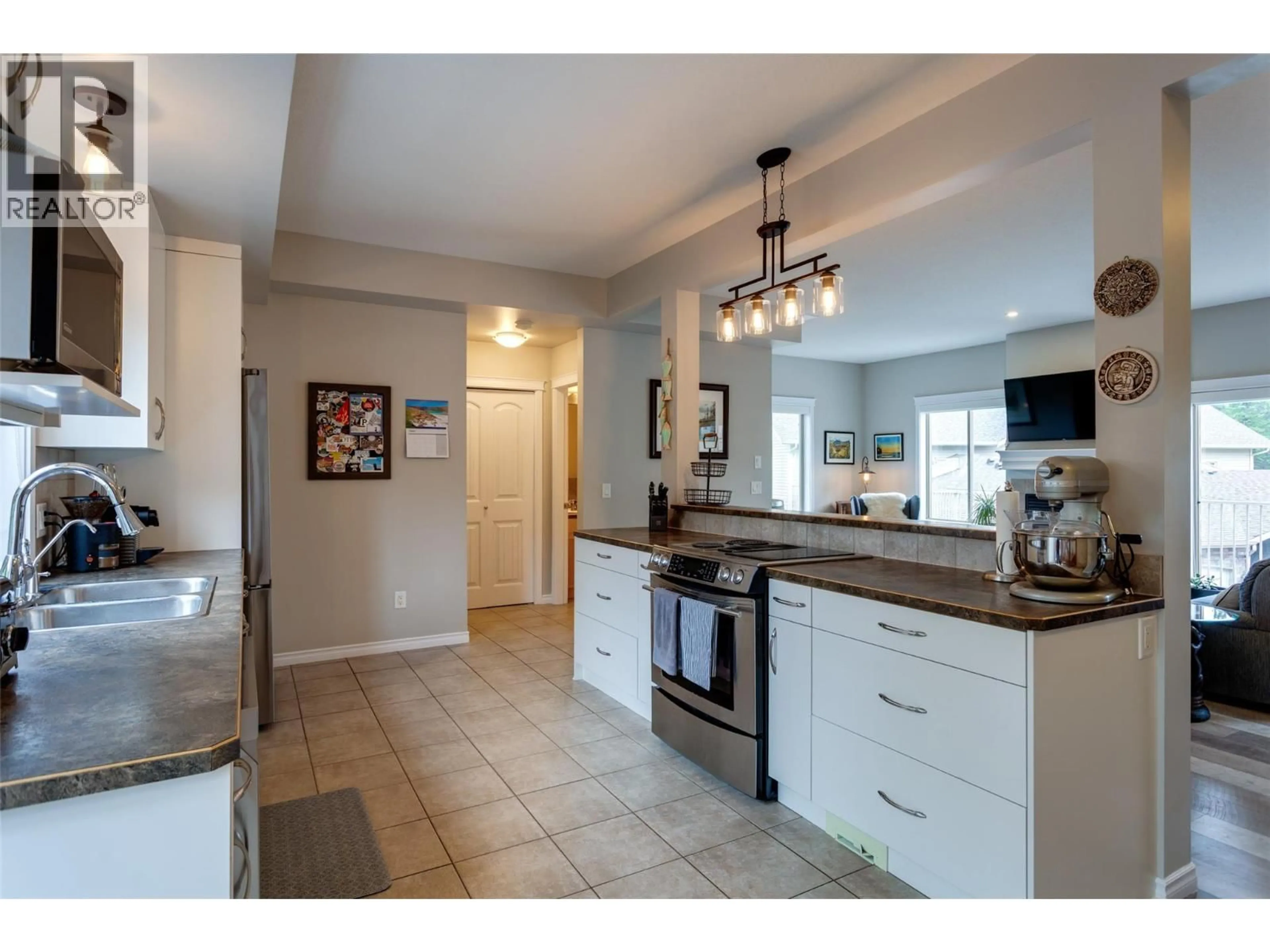 Open concept kitchen, ceramic/tile floor for 15 - 1798 OLYMPUS WAY, West Kelowna British Columbia V1Z4A6