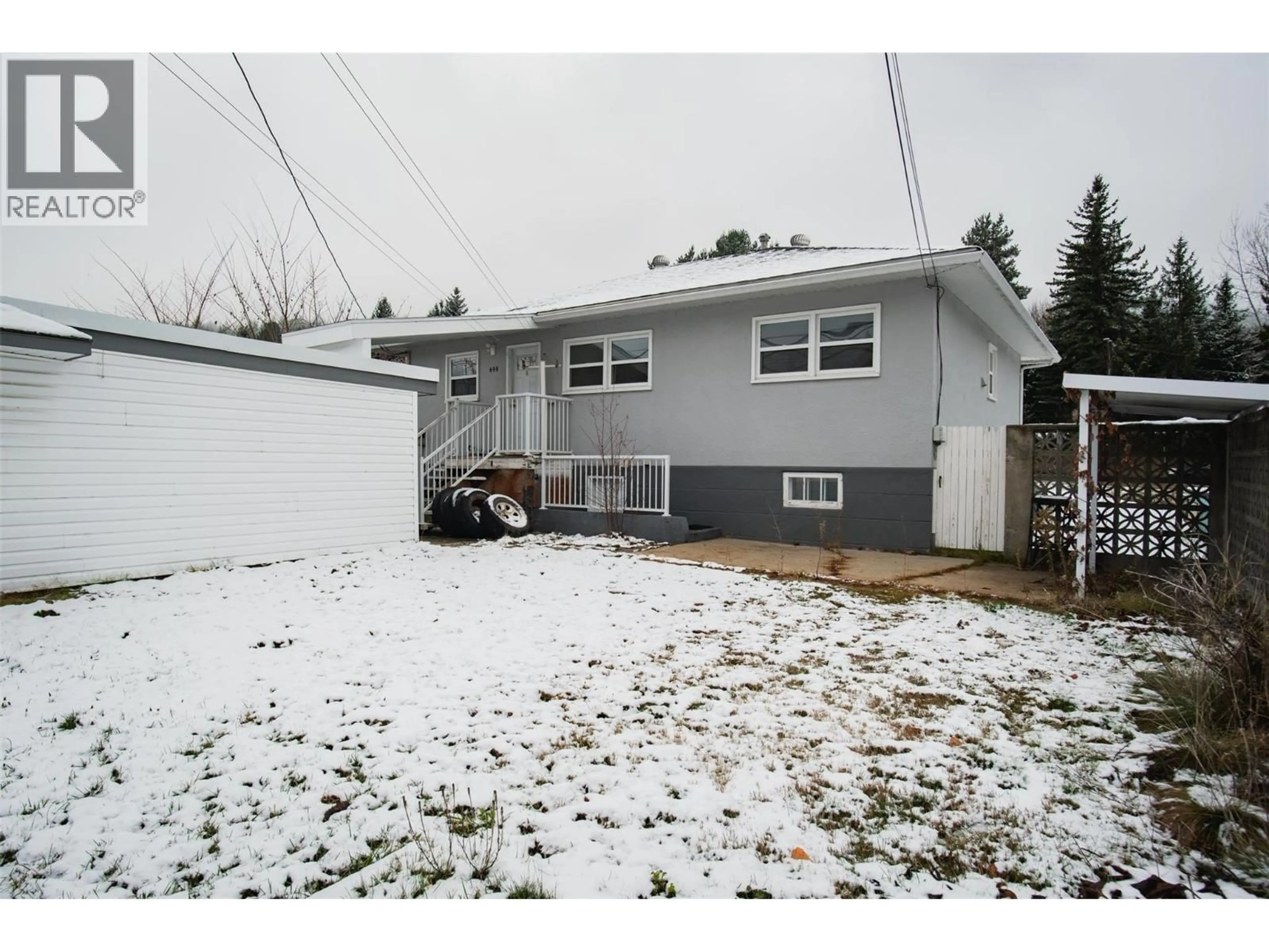 Home with vinyl exterior material, street for 690 SCHOFIELD HIGHWAY, Warfield British Columbia V1R2G8