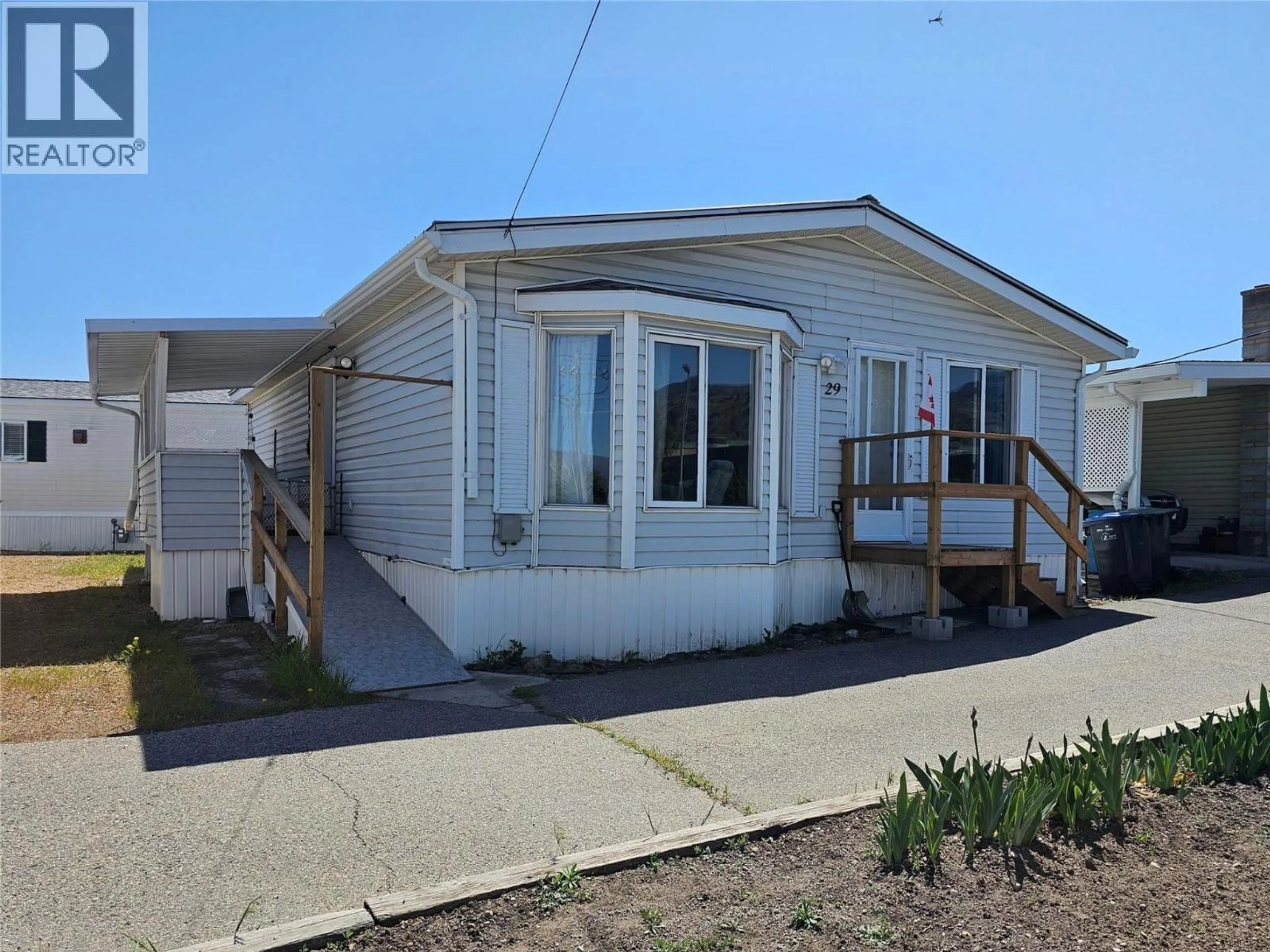 Home with vinyl exterior material, street for 29 - 6677 PARK DRIVE, Oliver British Columbia V0H1T0