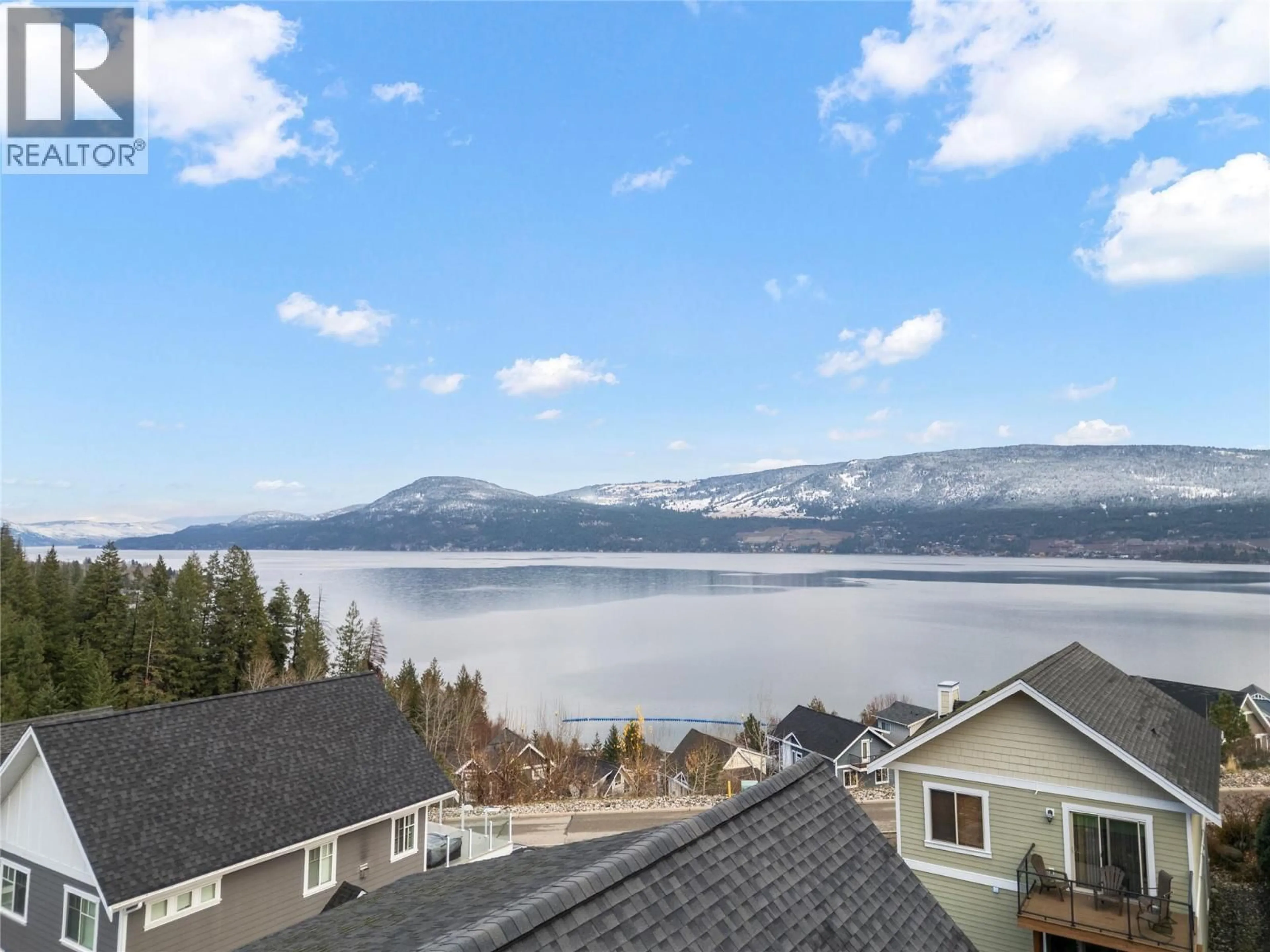 A pic from outside/outdoor area/front of a property/back of a property/a pic from drone, water/lake/river/ocean view for 134 - 6837 SANTIAGO LOOP, Kelowna British Columbia V1Z3R8