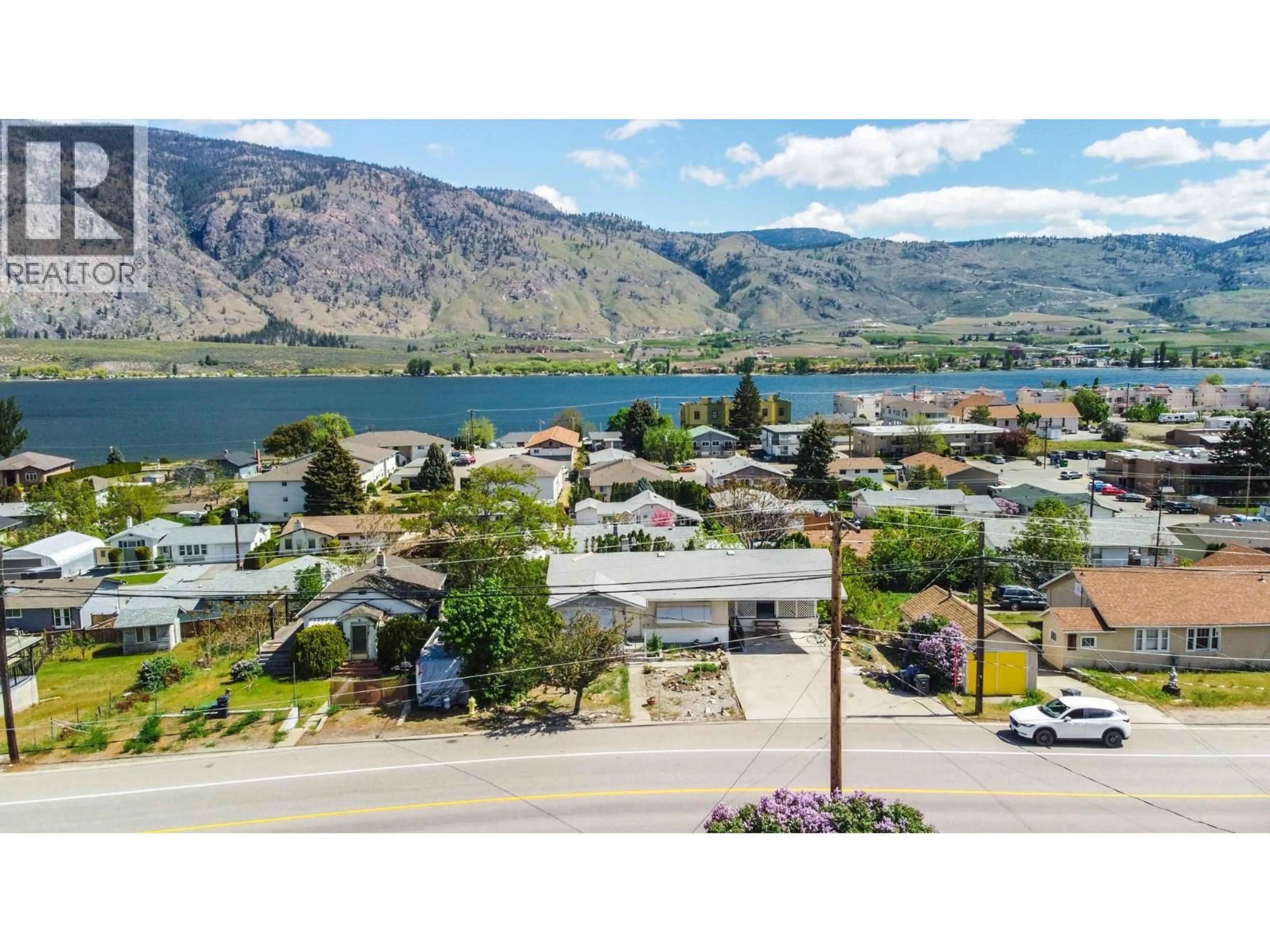 A pic from outside/outdoor area/front of a property/back of a property/a pic from drone, water/lake/river/ocean view for 8009 87TH STREET, Osoyoos British Columbia V0H1V0