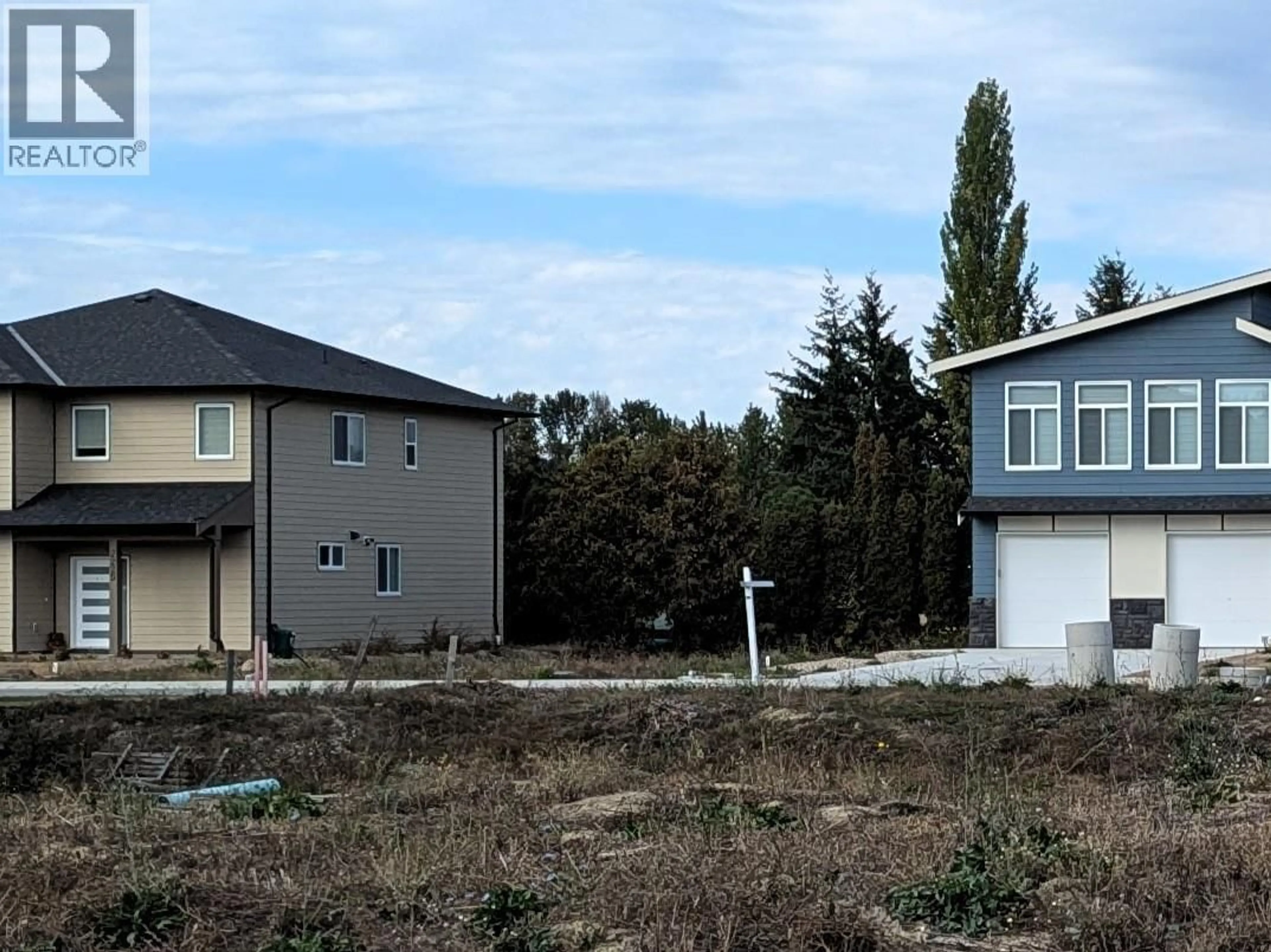 A pic from outside/outdoor area/front of a property/back of a property/a pic from drone, street for 2241 HEITMAN STREET, Enderby British Columbia V0E1V2