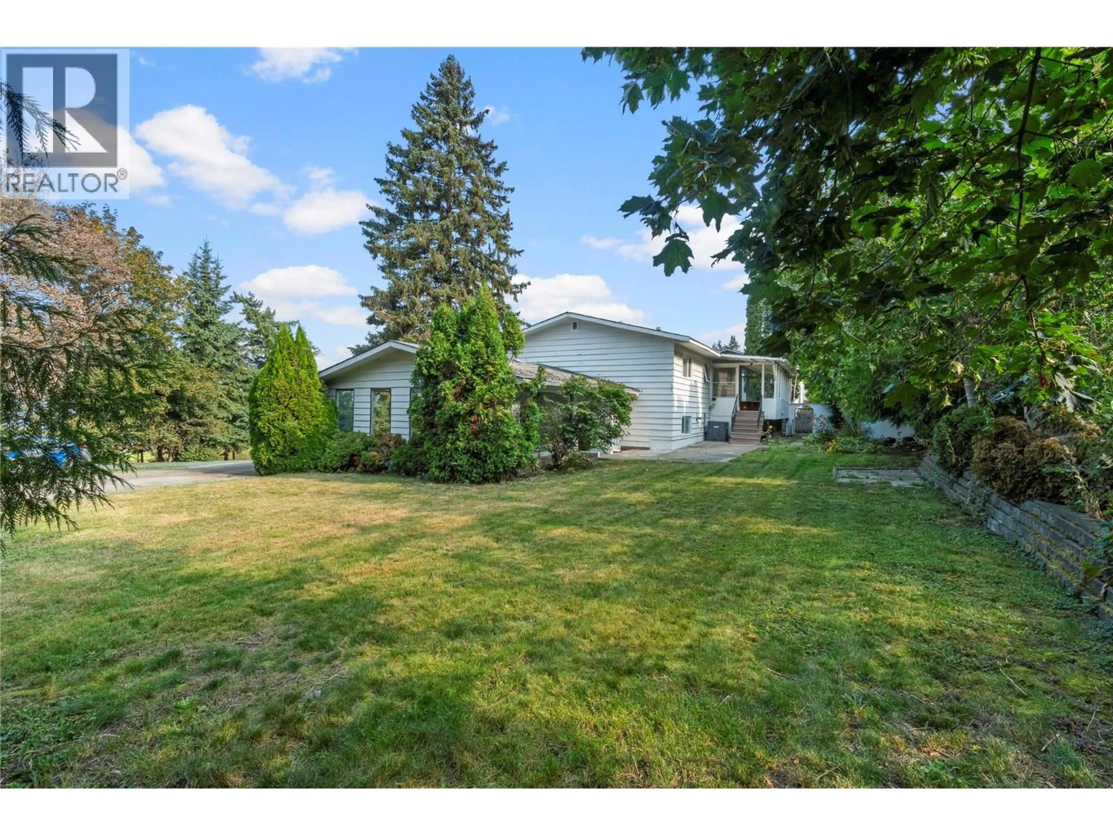 A pic from outside/outdoor area/front of a property/back of a property/a pic from drone, unknown for 1160 LAKESHORE ROAD NORTHEAST, Salmon Arm British Columbia V1E2V7