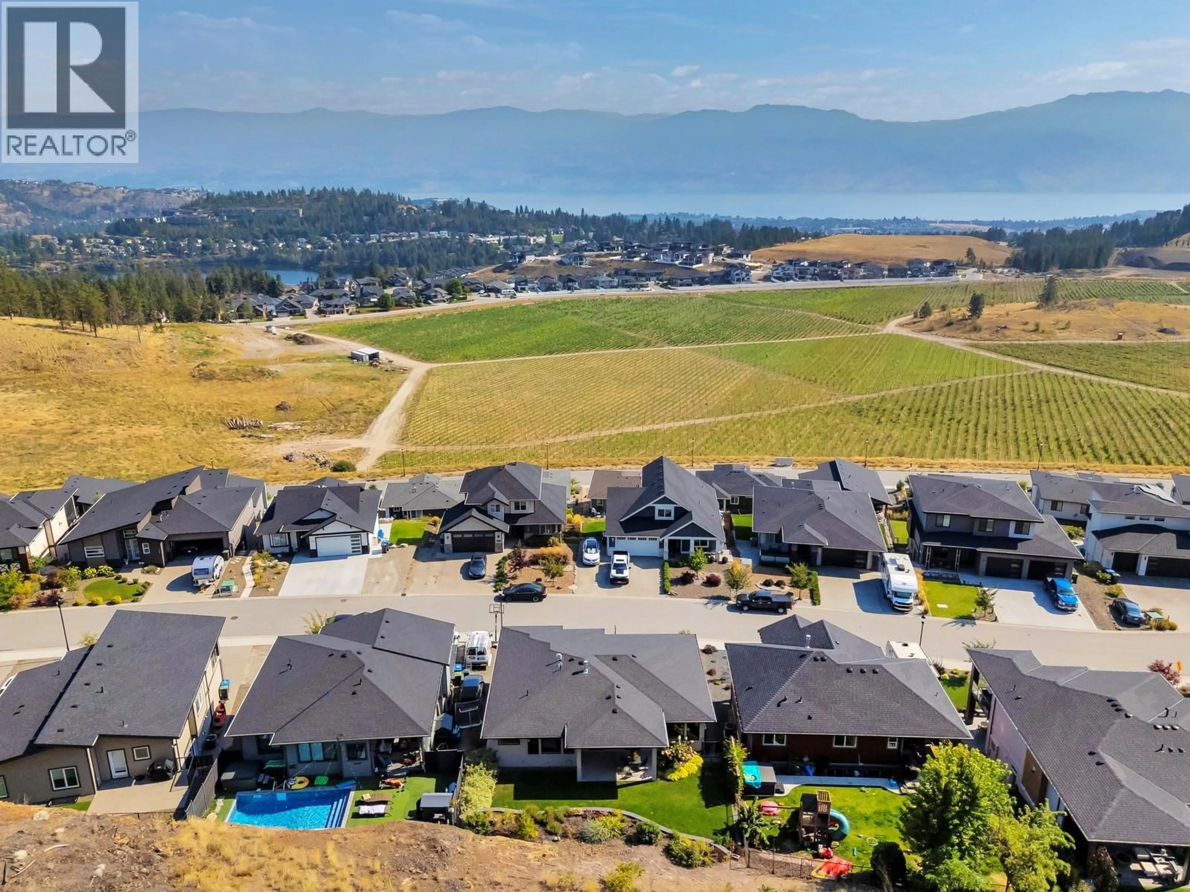 A pic from outside/outdoor area/front of a property/back of a property/a pic from drone, mountain view for 2594 CROWN CREST DRIVE, West Kelowna British Columbia V4T3N3