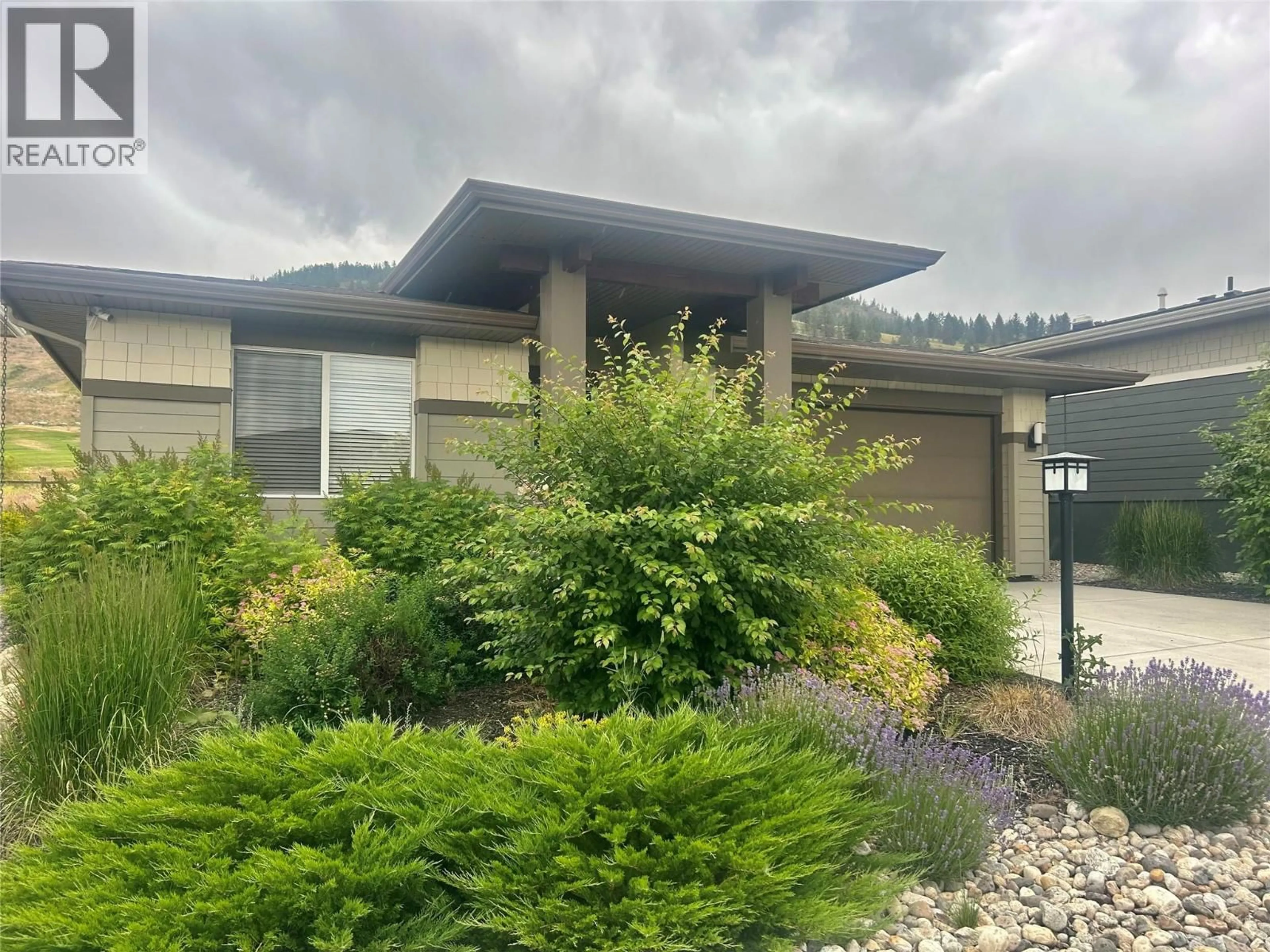 A pic from outside/outdoor area/front of a property/back of a property/a pic from drone, unknown for 1769 TOWER RANCH DRIVE, Kelowna British Columbia V1P1T2