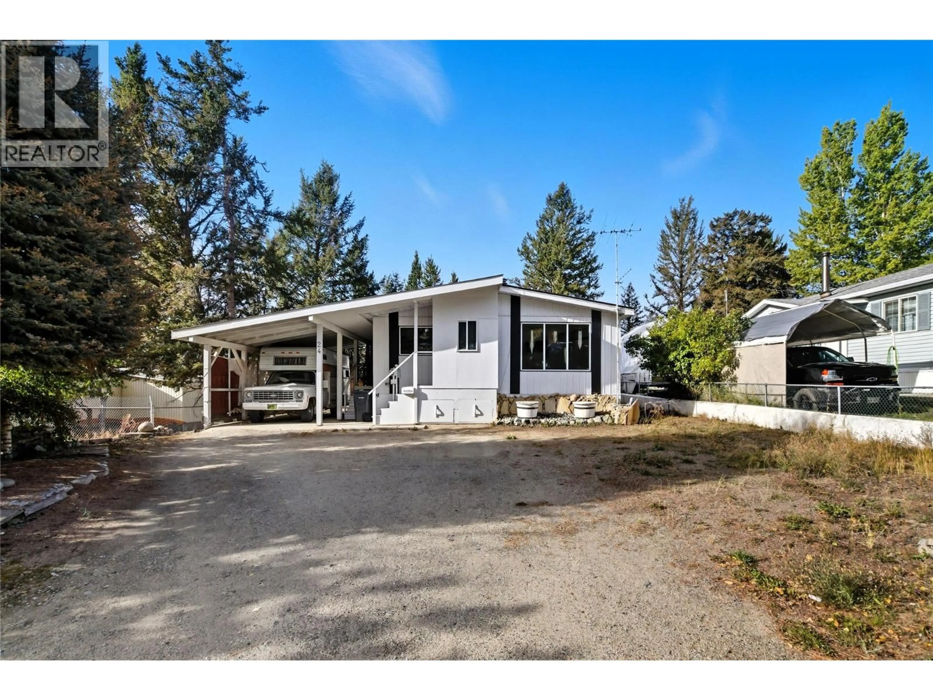 Home with vinyl exterior material, street for 24 JASPER DRIVE, Logan Lake British Columbia V0K1W0