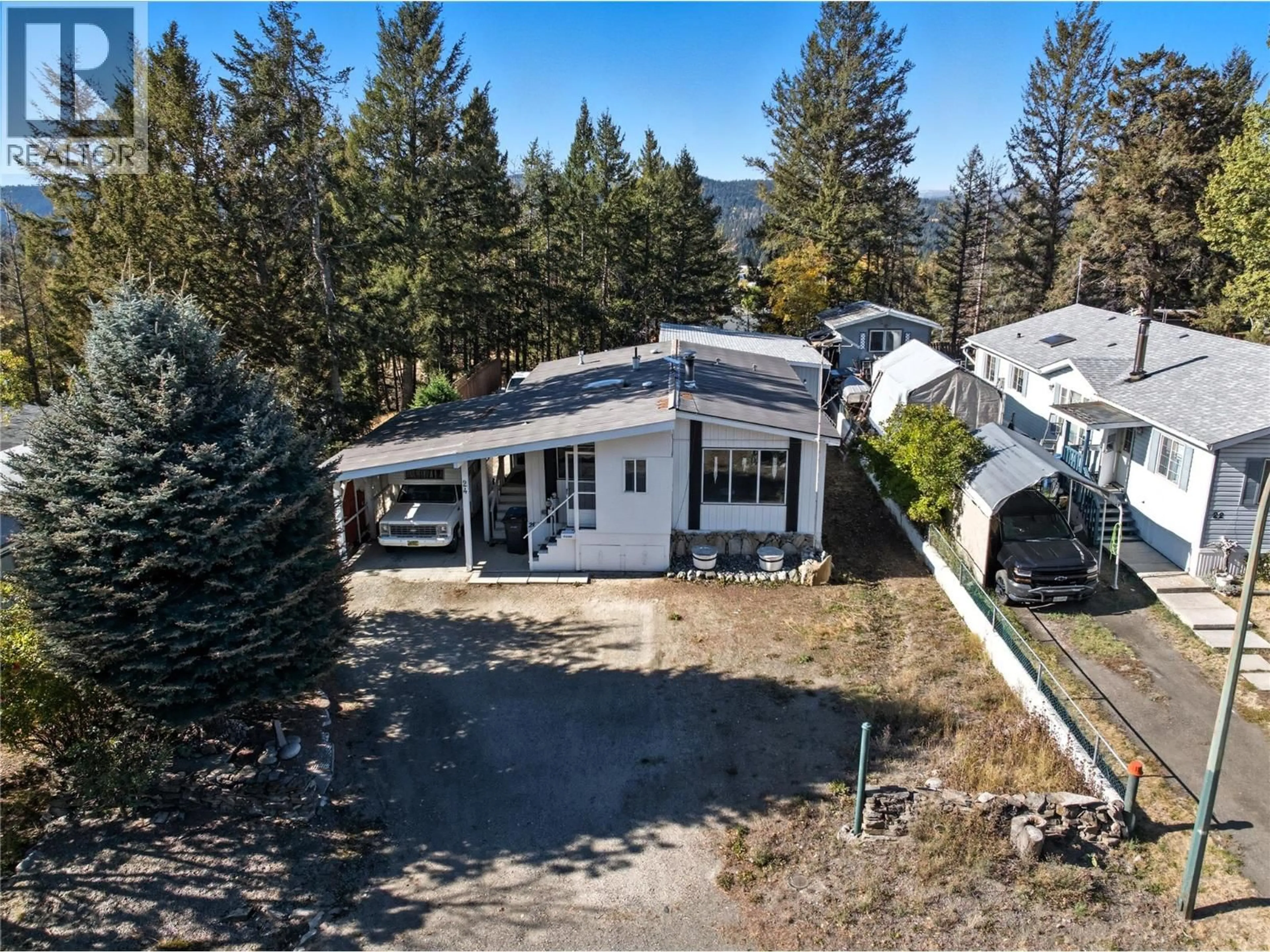 A pic from outside/outdoor area/front of a property/back of a property/a pic from drone, mountain view for 24 JASPER DRIVE, Logan Lake British Columbia V0K1W0