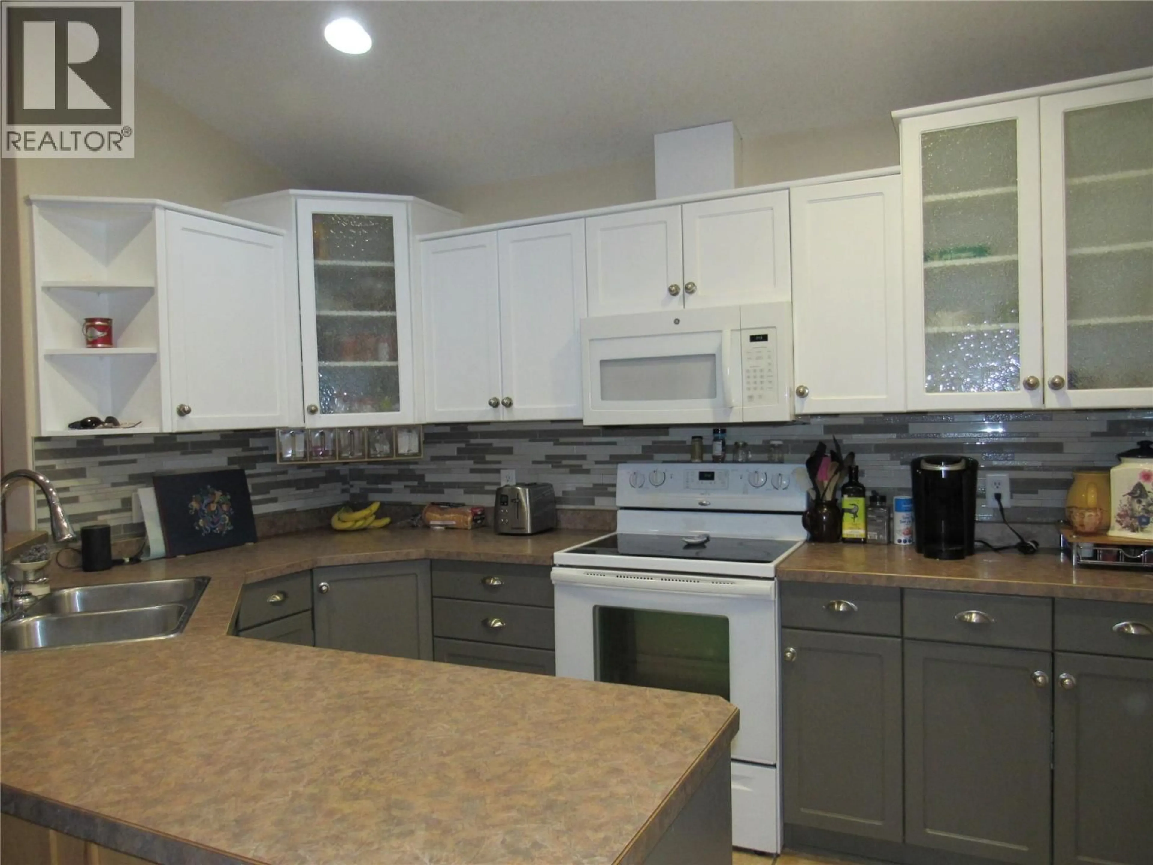 Open concept kitchen, unknown for 1659 GREYSTONE PLACE, Castlegar British Columbia V1N4J4