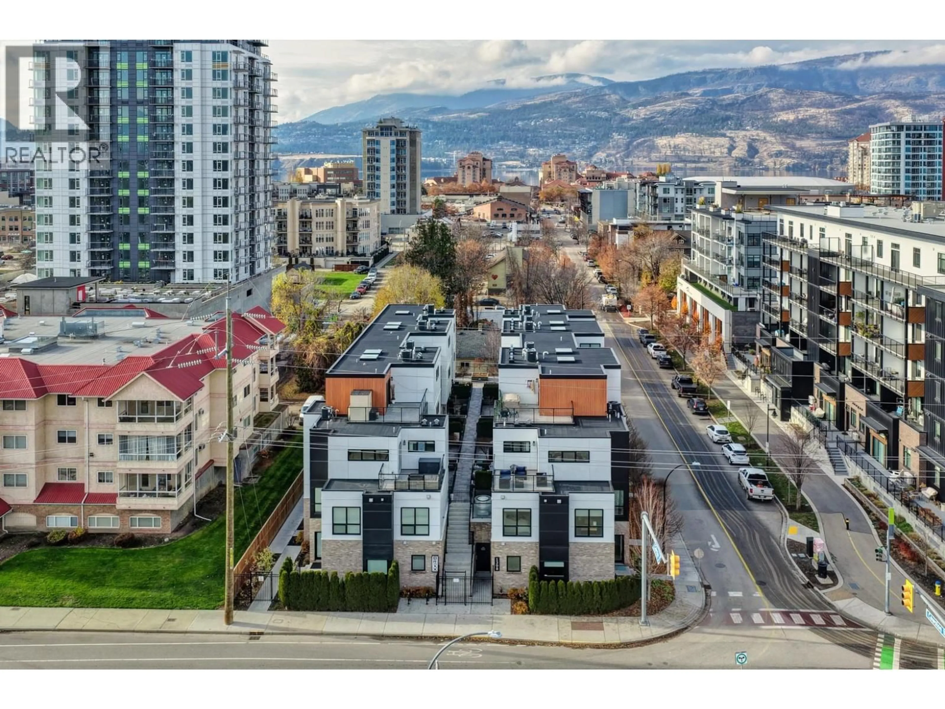 A pic from outside/outdoor area/front of a property/back of a property/a pic from drone, city buildings view from balcony for 106 - 1308 RICHTER STREET, Kelowna British Columbia V1Y2L3