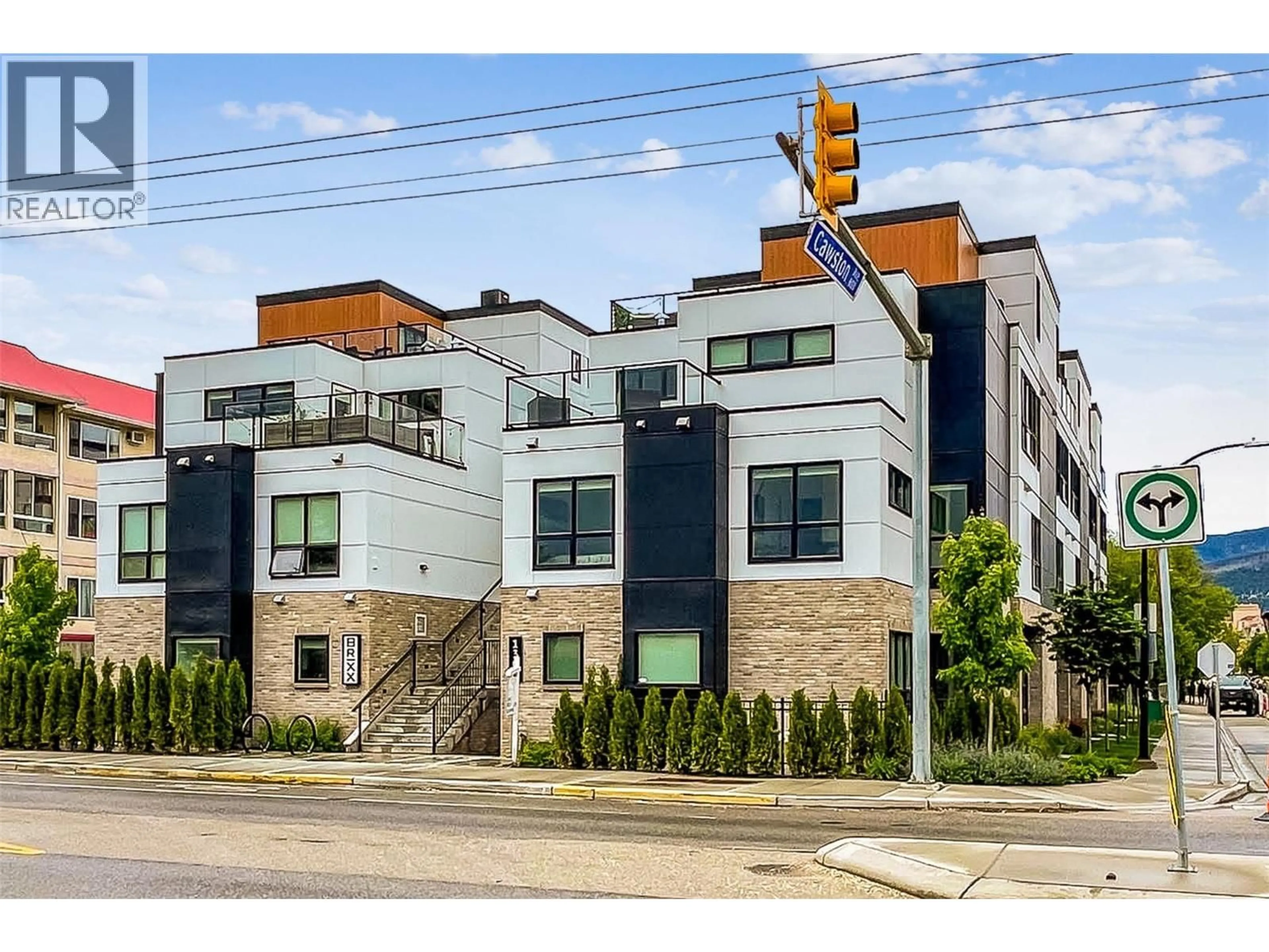 Home with brick exterior material, street for 106 - 1308 RICHTER STREET, Kelowna British Columbia V1Y2L3