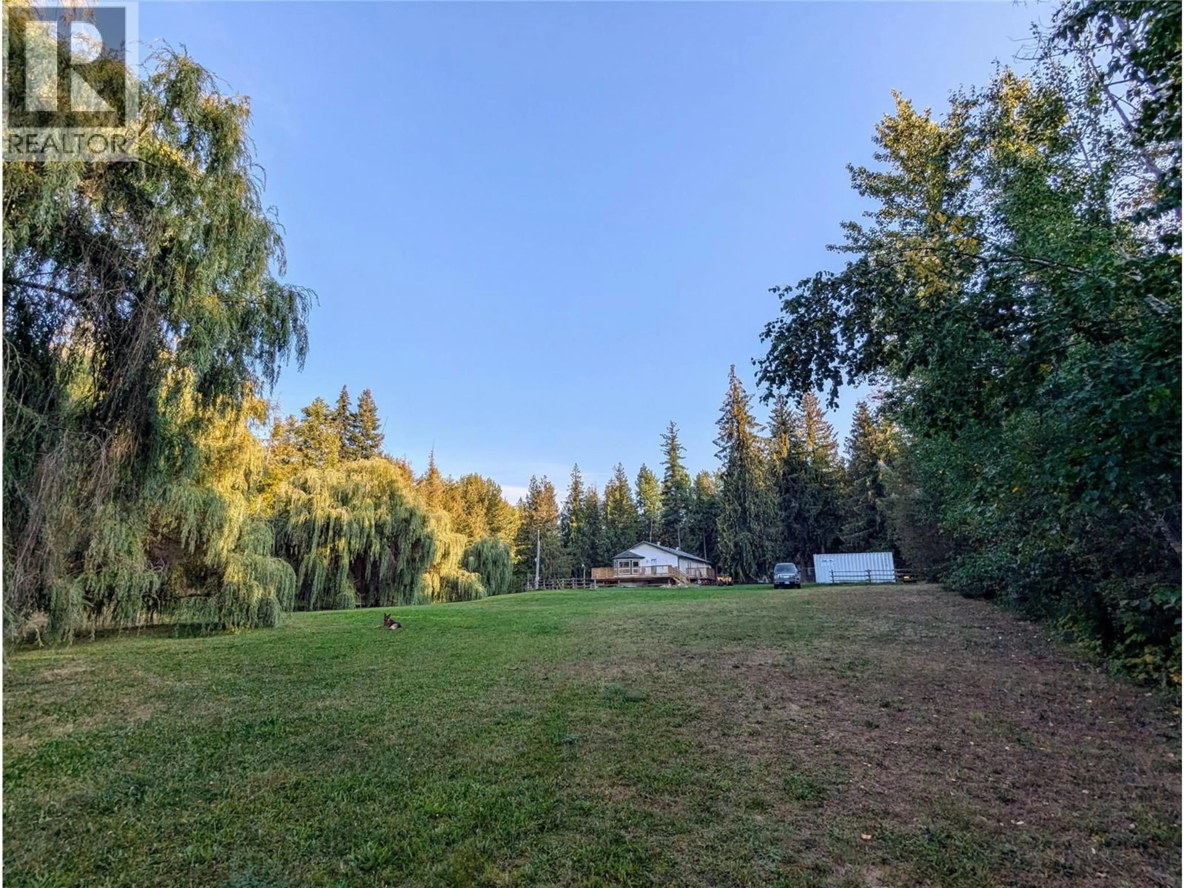 A pic from outside/outdoor area/front of a property/back of a property/a pic from drone, forest/trees view for 5060 TATLOW ROAD, Salmon Arm British Columbia V1E2P8