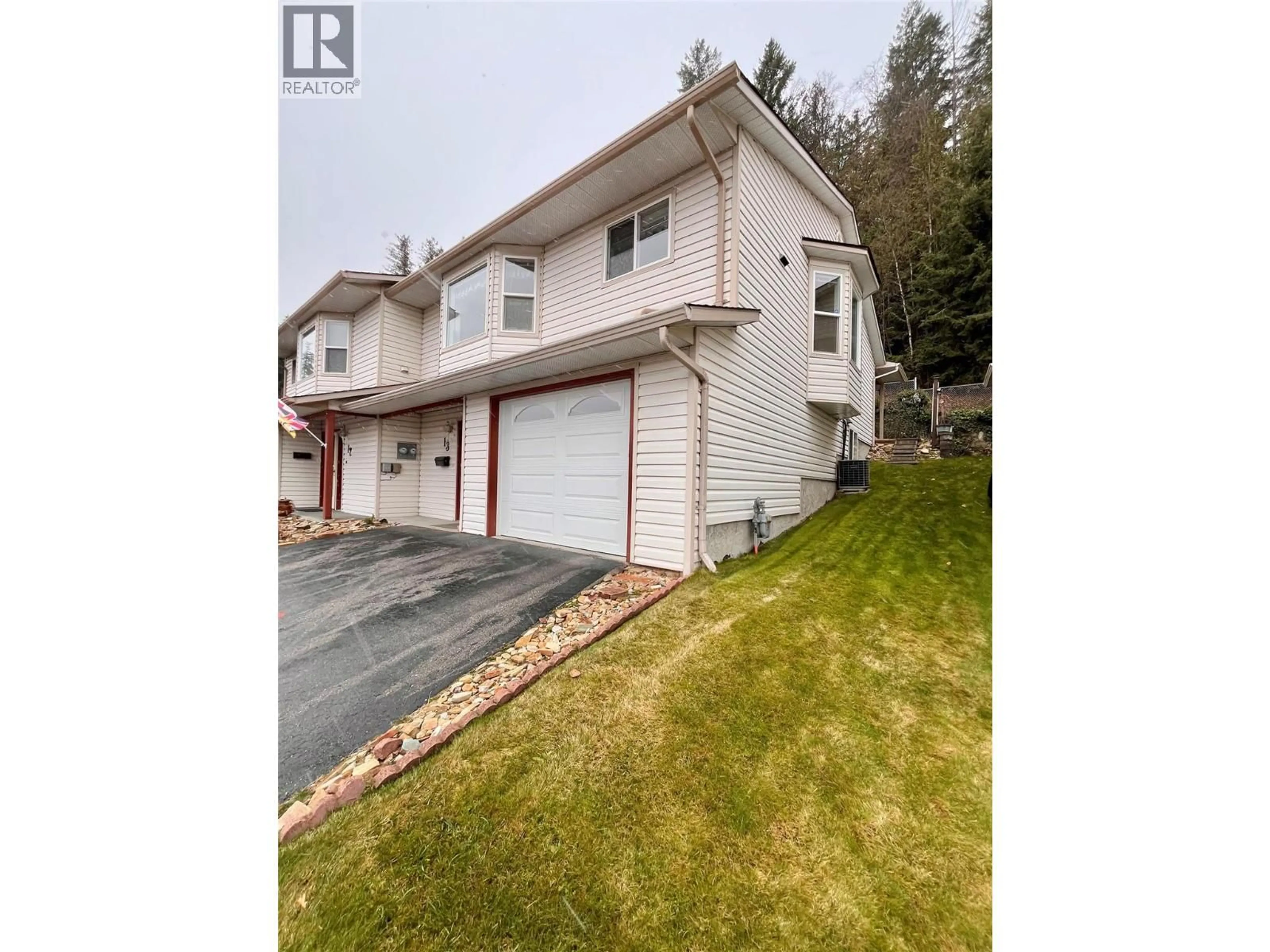 A pic from outside/outdoor area/front of a property/back of a property/a pic from drone, street for 13 - 2210 COLUMBIA AVENUE, Castlegar British Columbia V1N2X1