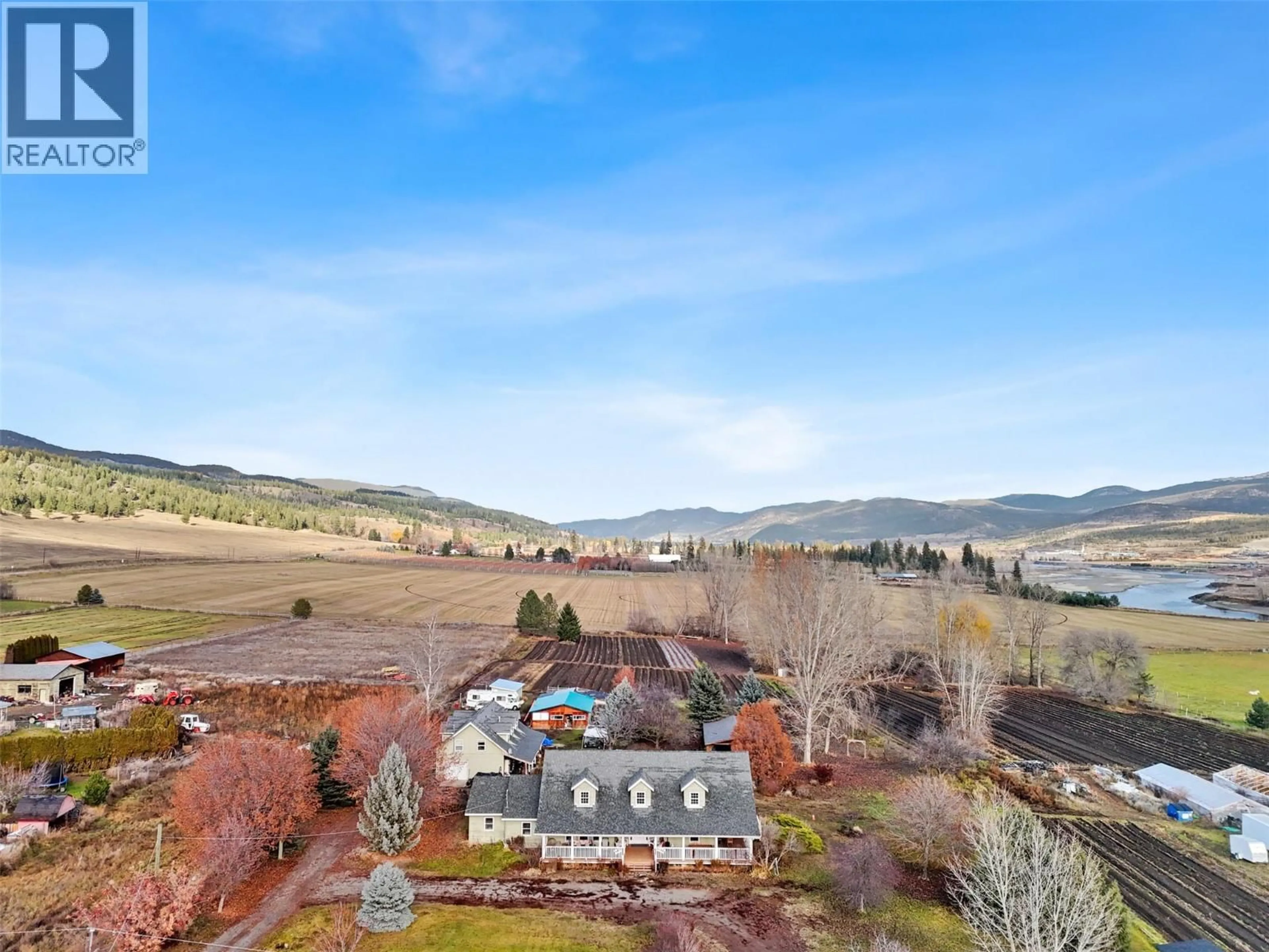 A pic from outside/outdoor area/front of a property/back of a property/a pic from drone, mountain view for 710 DAIRY ROAD, Kamloops British Columbia V2B8N5