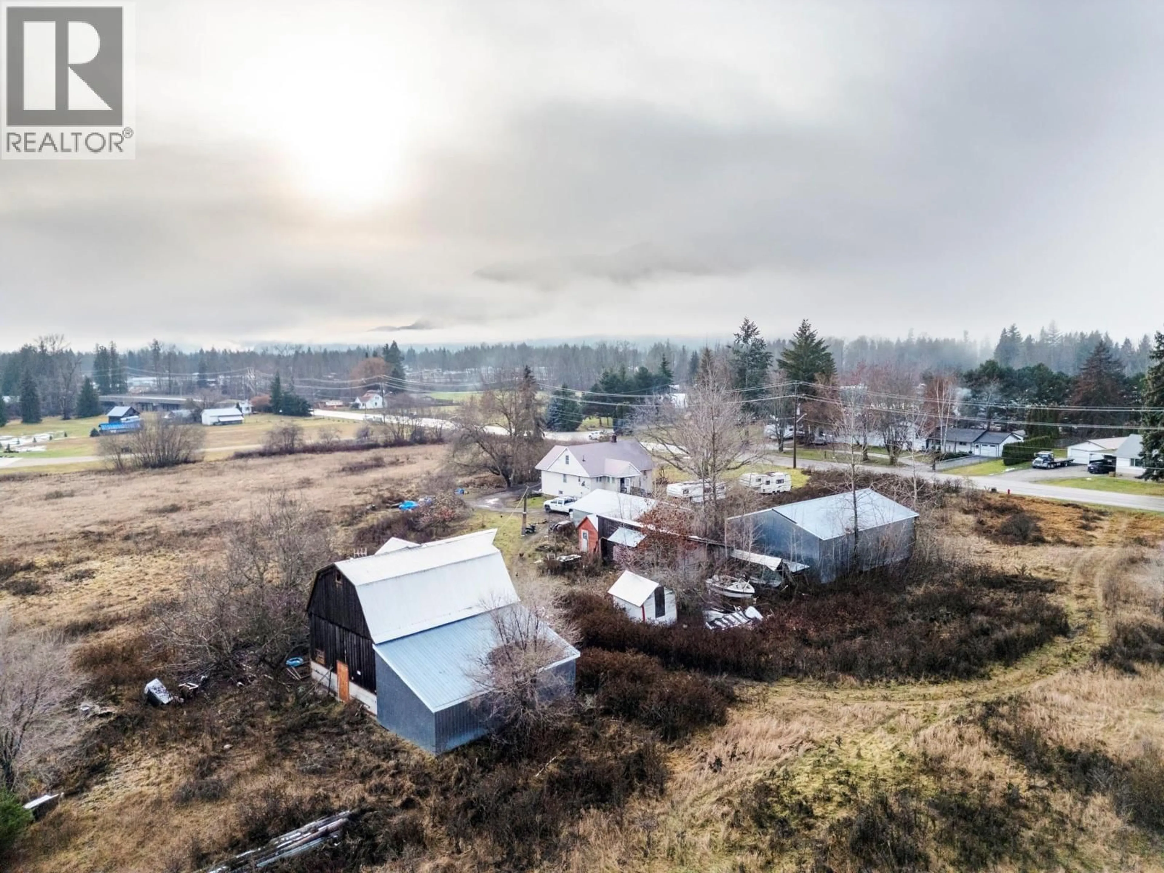 A pic from outside/outdoor area/front of a property/back of a property/a pic from drone, mountain view for 1513 SOLSQUA SICAMOUS ROAD, Sicamous British Columbia V0E2V0