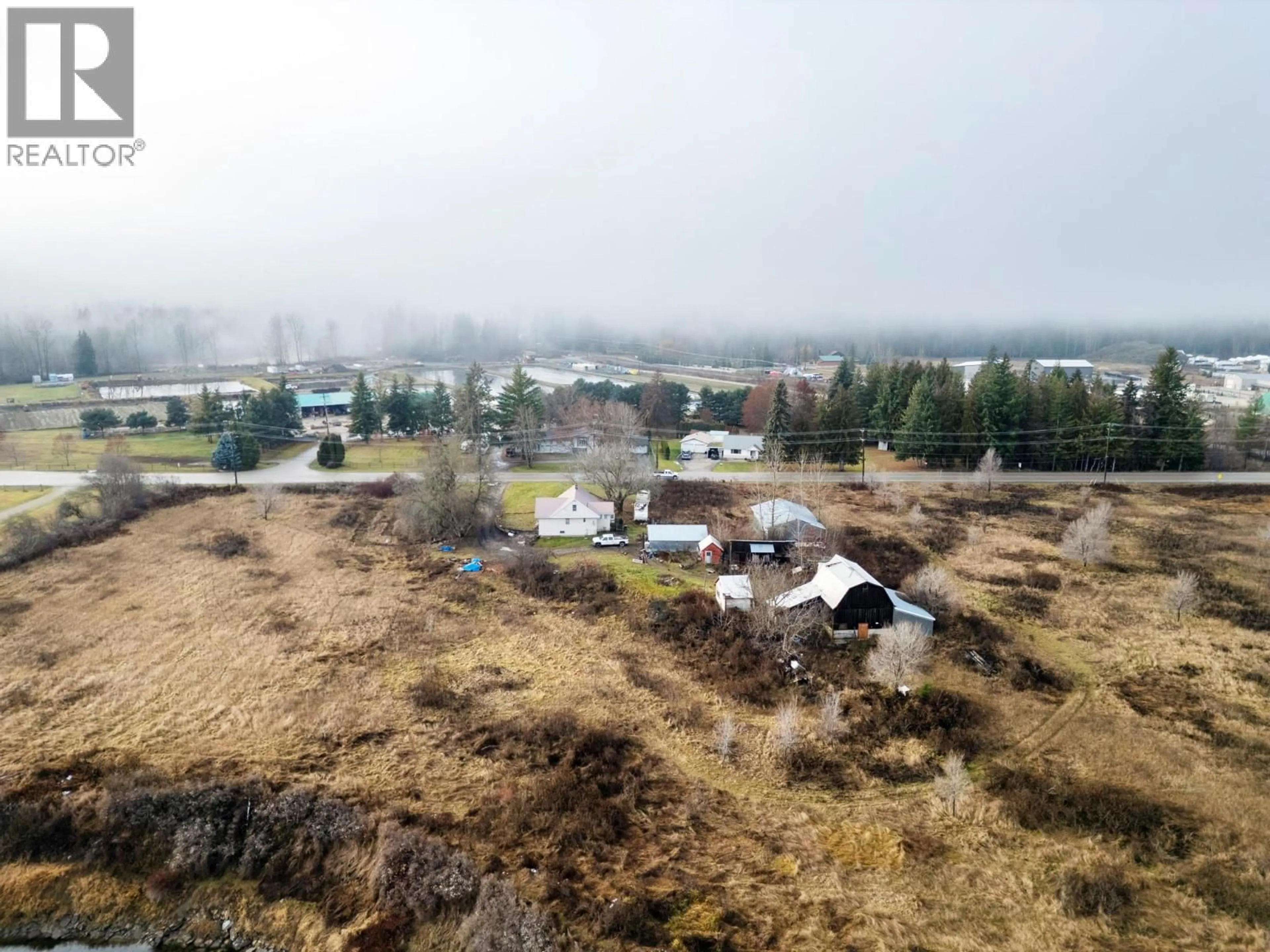 A pic from outside/outdoor area/front of a property/back of a property/a pic from drone, mountain view for 1513 SOLSQUA SICAMOUS ROAD, Sicamous British Columbia V0E2V0