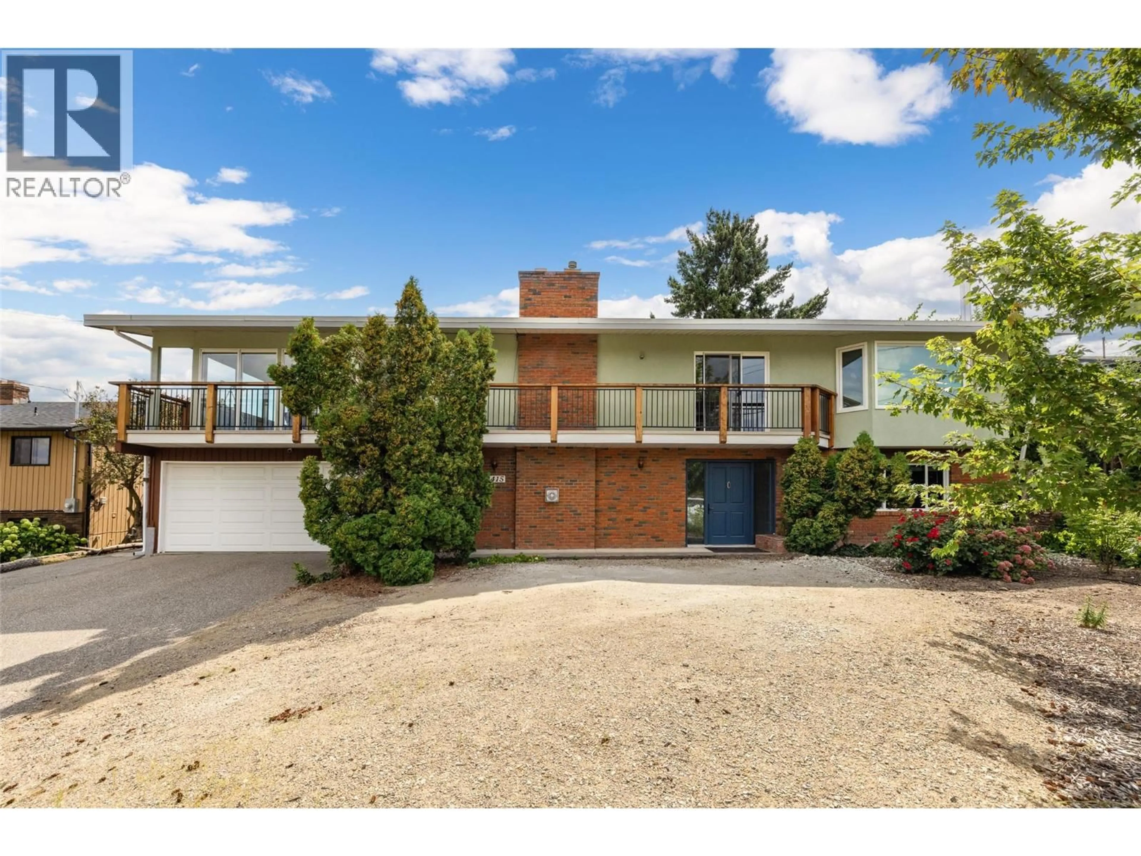 A pic from outside/outdoor area/front of a property/back of a property/a pic from drone, street for 2415 COLLINGWOOD ROAD, West Kelowna British Columbia V1Z2C3
