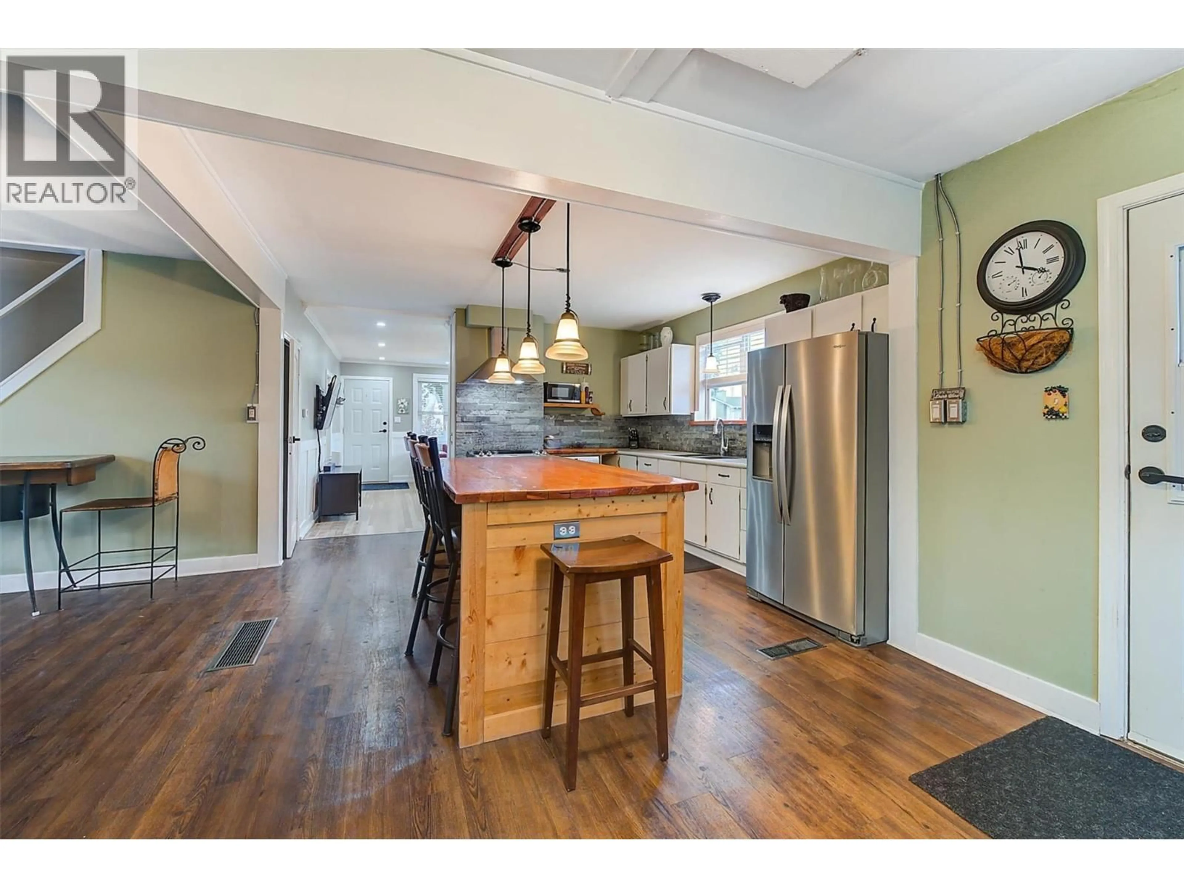 Open concept kitchen, wood/laminate floor for 280 MUGFORD ROAD, Kelowna British Columbia V1X2E2