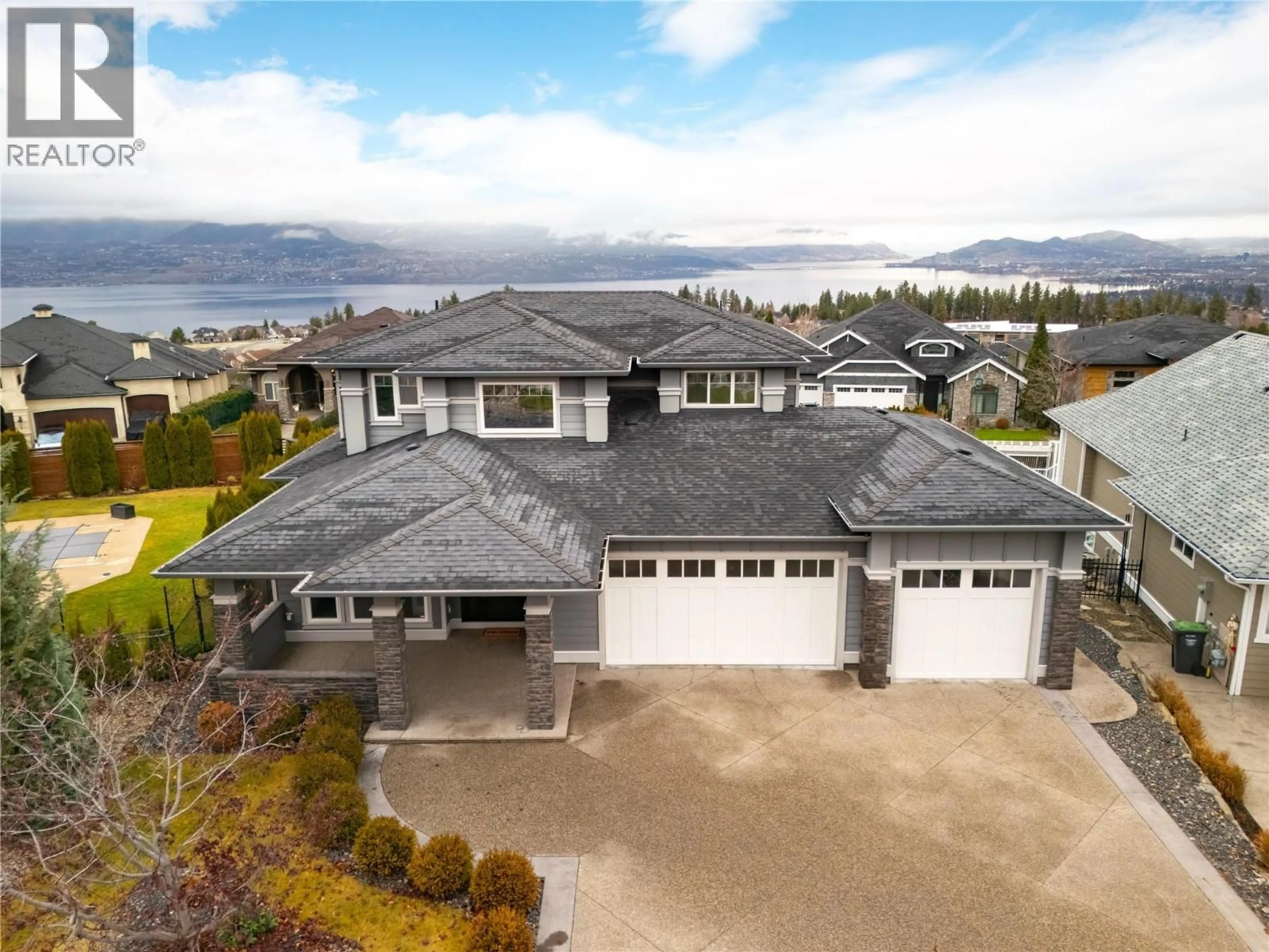 A pic from outside/outdoor area/front of a property/back of a property/a pic from drone, unknown for 440 AUDUBON COURT, Kelowna British Columbia V1W5K3