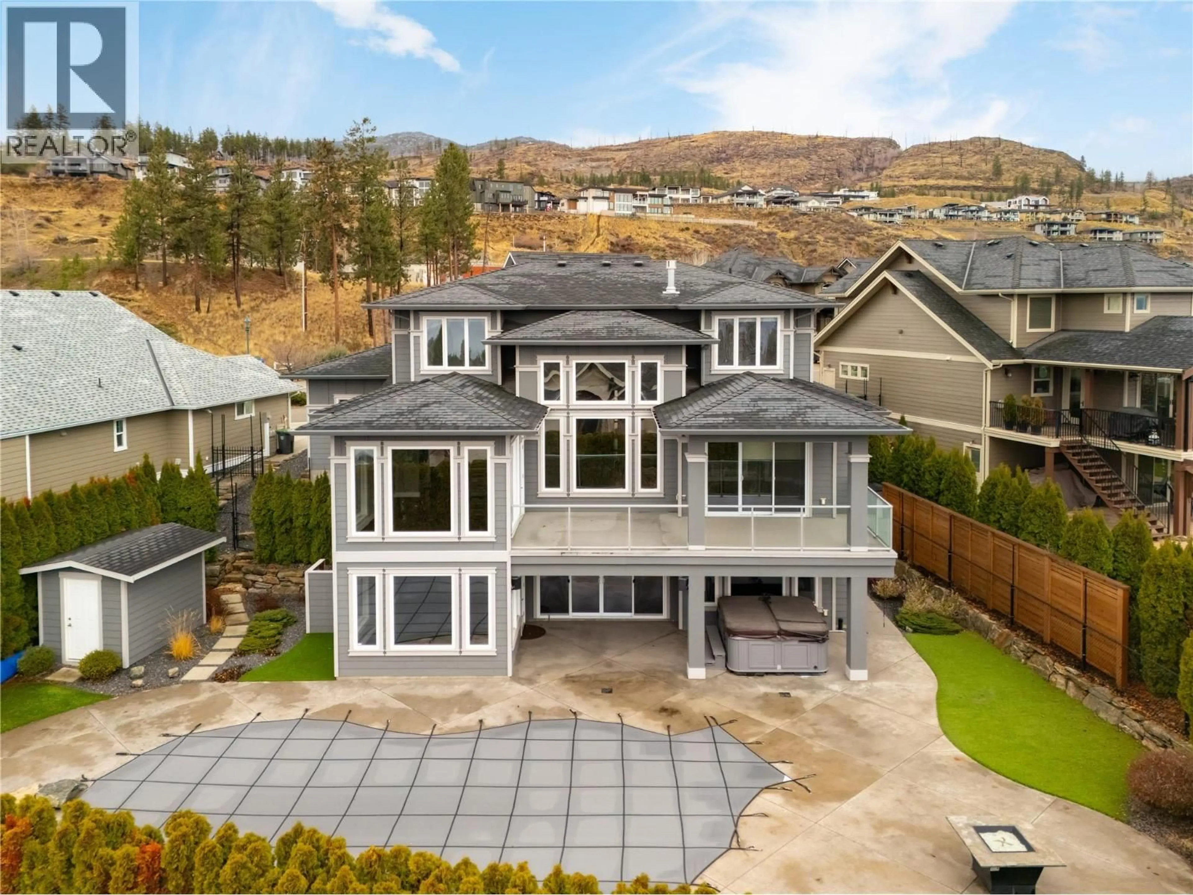 A pic from outside/outdoor area/front of a property/back of a property/a pic from drone, mountain view for 440 AUDUBON COURT, Kelowna British Columbia V1W5K3