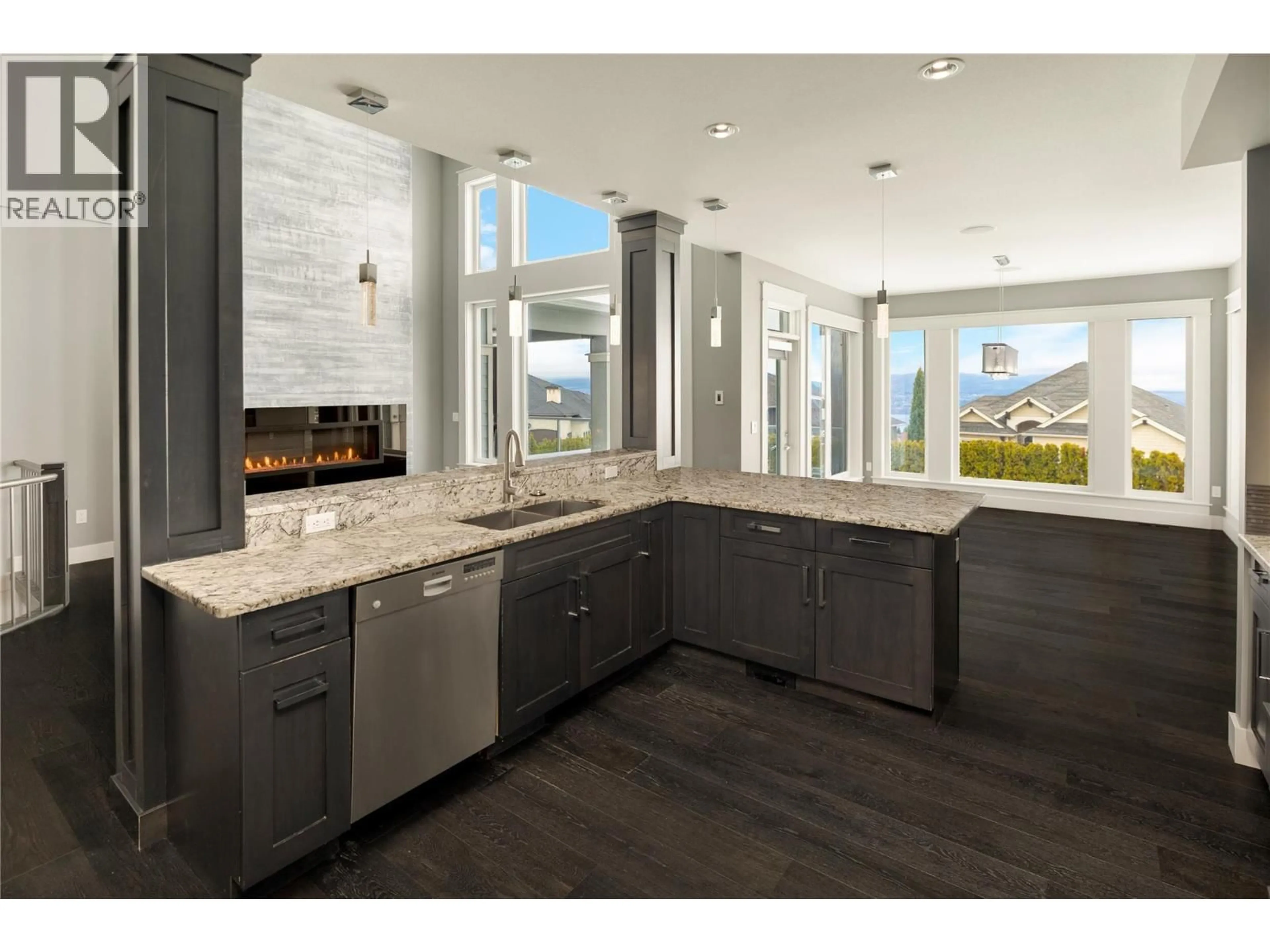 Open concept kitchen, ceramic/tile floor for 440 AUDUBON COURT, Kelowna British Columbia V1W5K3