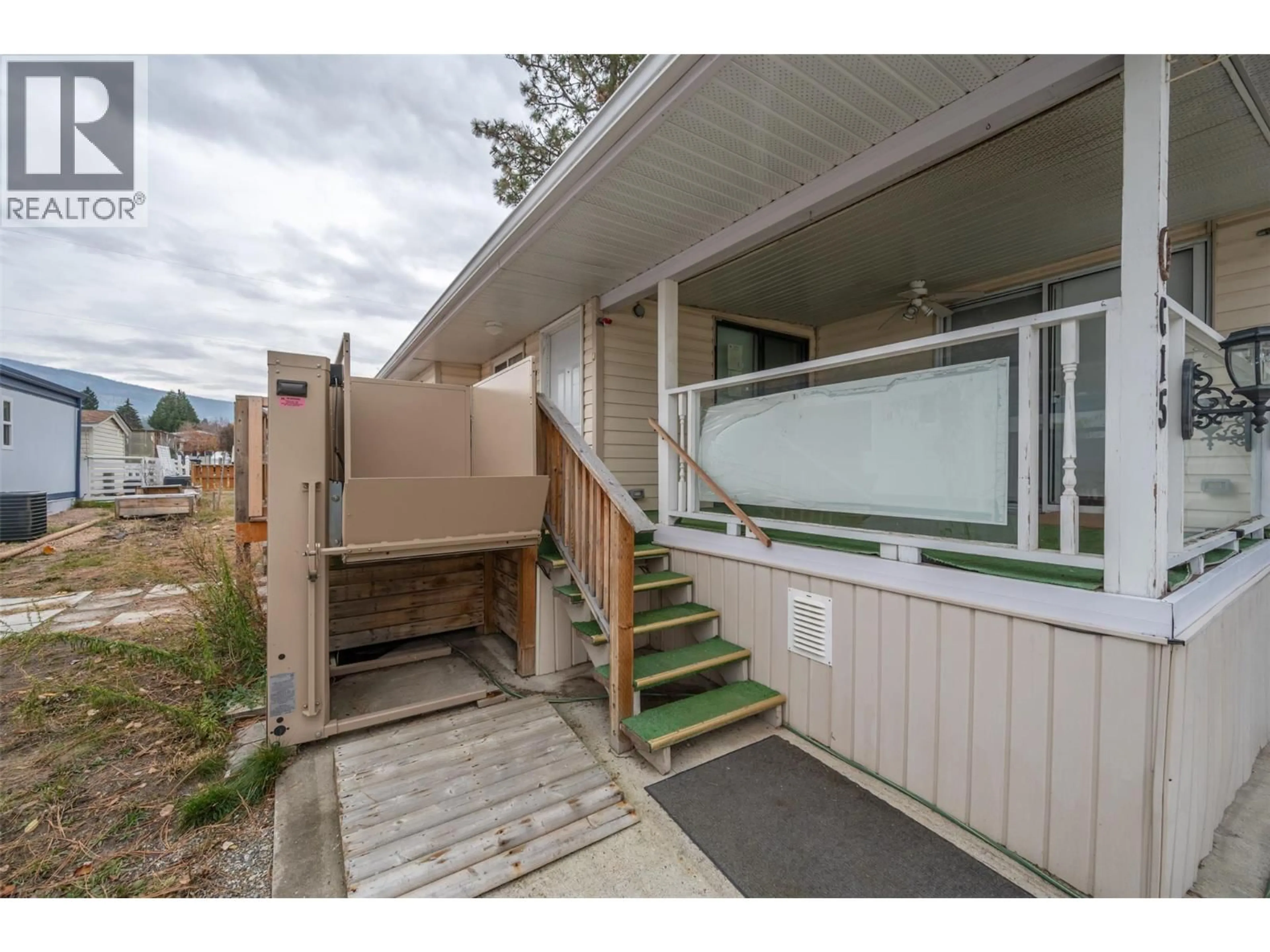 Home with vinyl exterior material, street for C15 - 4505 MCLEAN CREEK ROAD, Okanagan Falls British Columbia V0H1R1