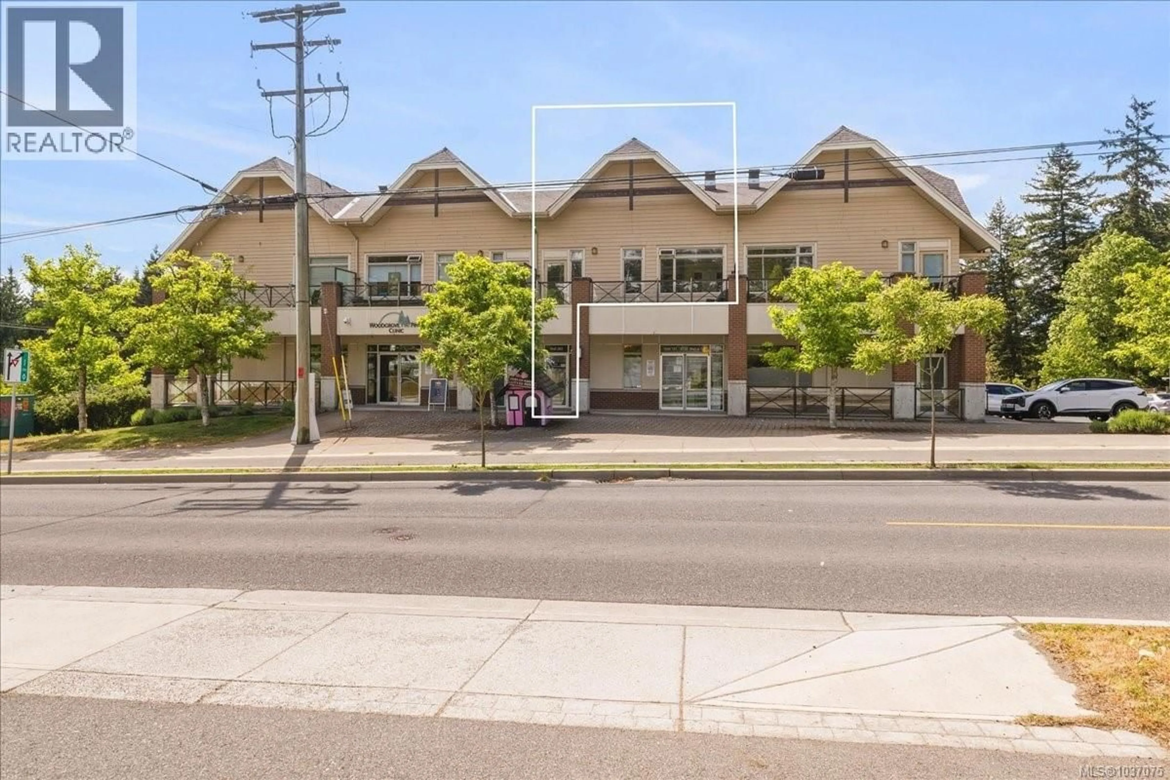 A pic from outside/outdoor area/front of a property/back of a property/a pic from drone, street for 202 - 6135 METRAL DRIVE, Nanaimo British Columbia V9T2L7