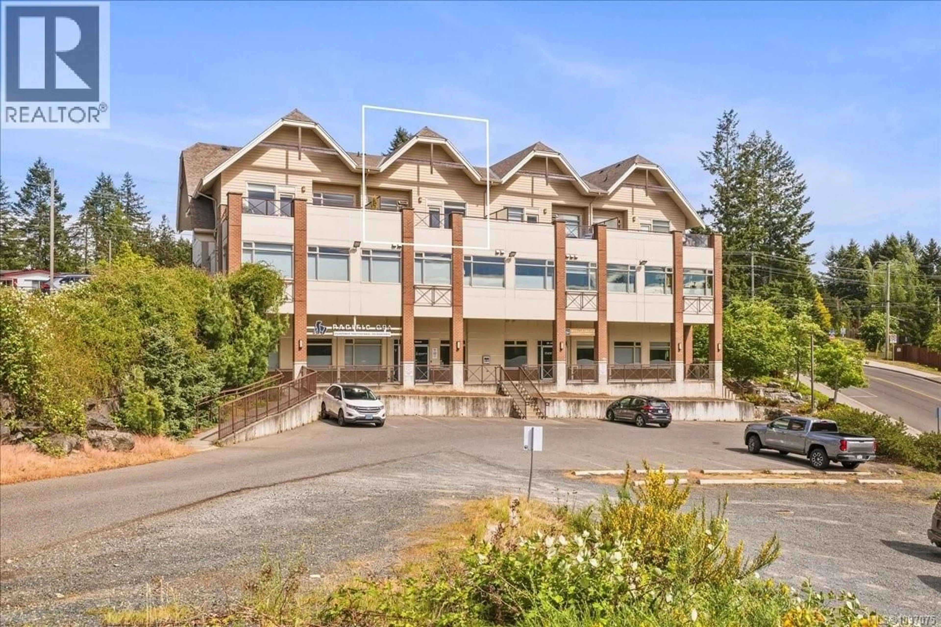 A pic from outside/outdoor area/front of a property/back of a property/a pic from drone, building for 202 - 6135 METRAL DRIVE, Nanaimo British Columbia V9T2L7