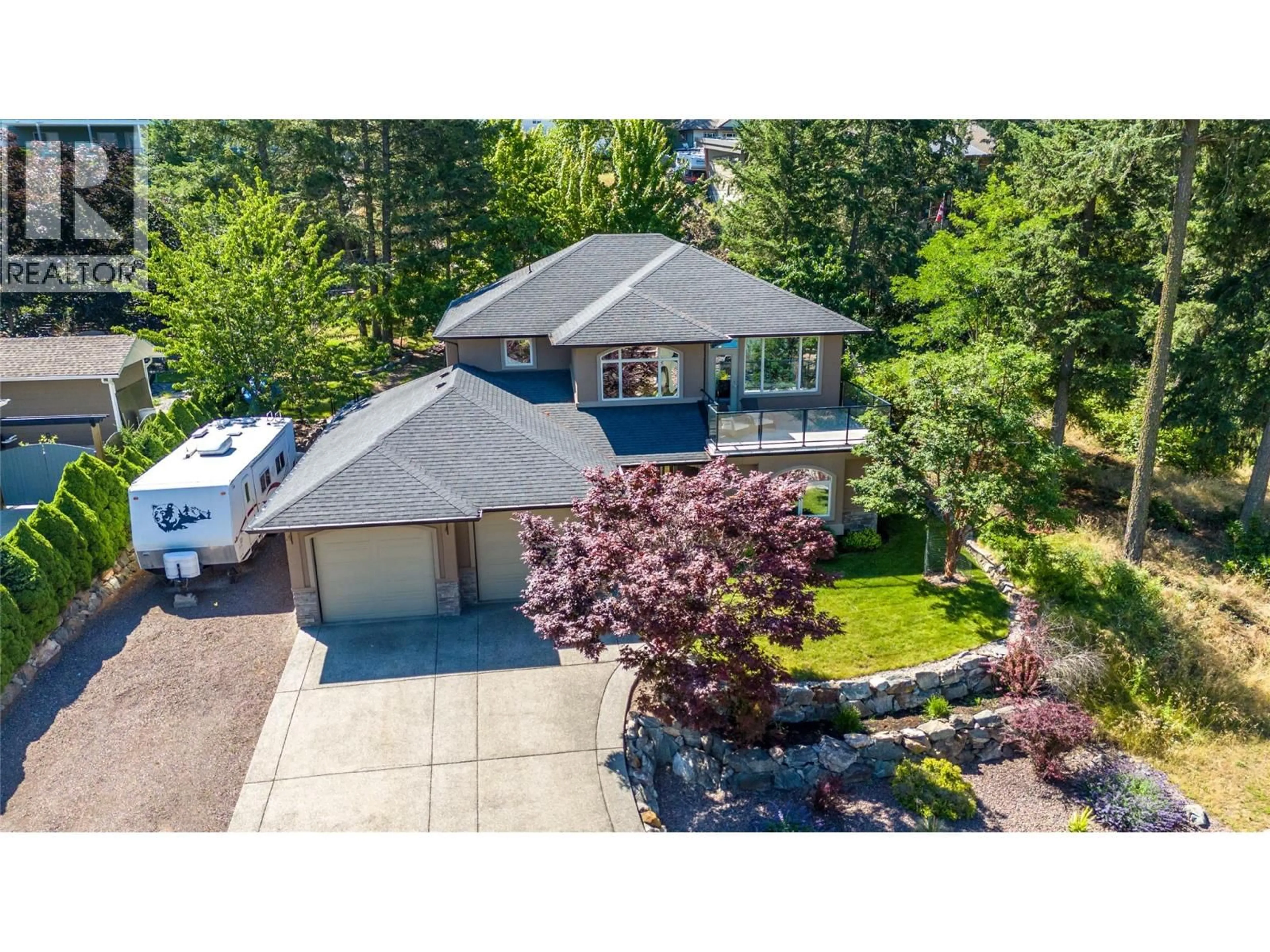 A pic from outside/outdoor area/front of a property/back of a property/a pic from drone, street for 30 - 40 KESTREL PLACE, Vernon British Columbia V1H1S6