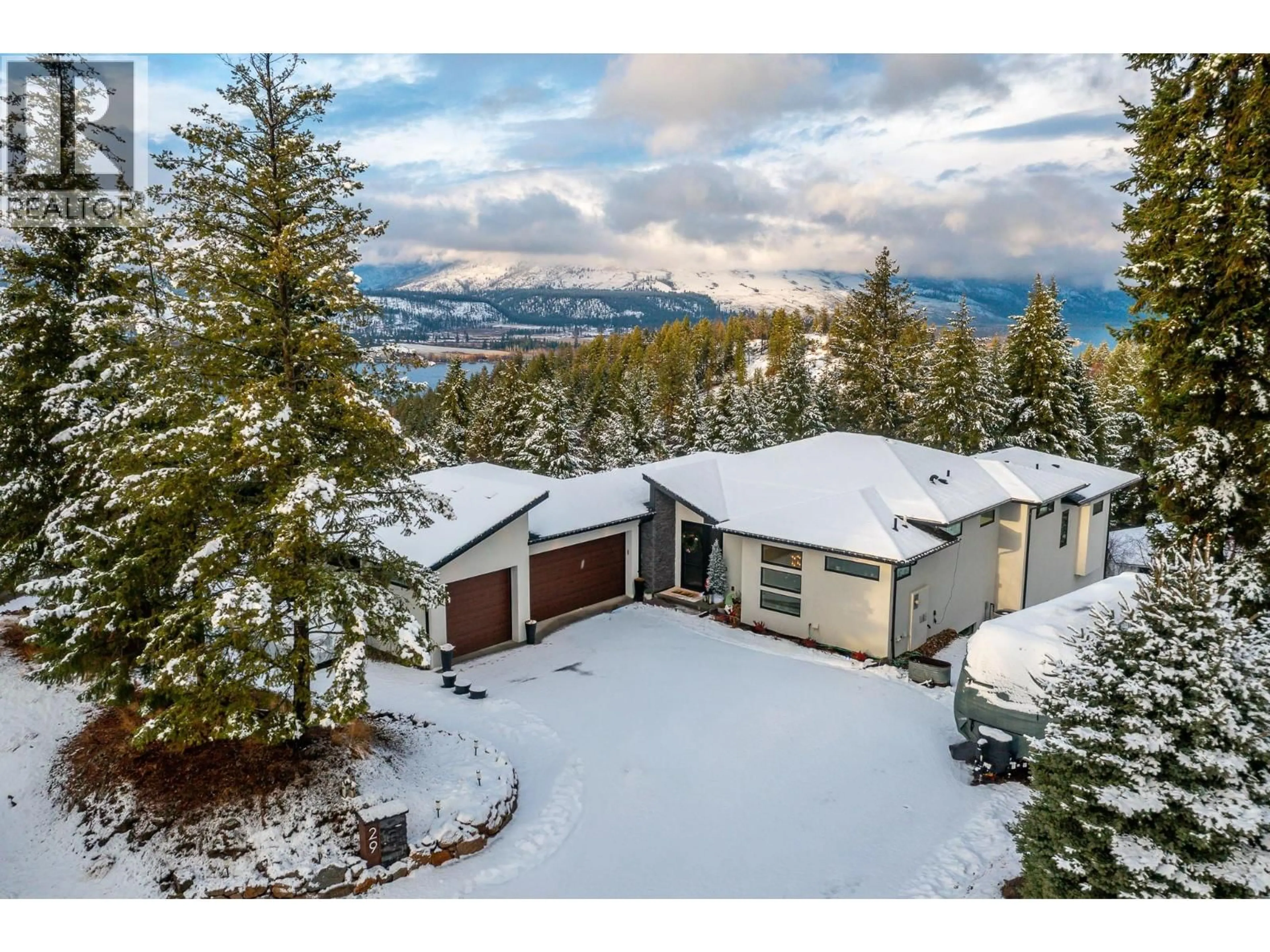A pic from outside/outdoor area/front of a property/back of a property/a pic from drone, mountain view for 29 - 9196 TRONSON ROAD, Vernon British Columbia V1H1E8