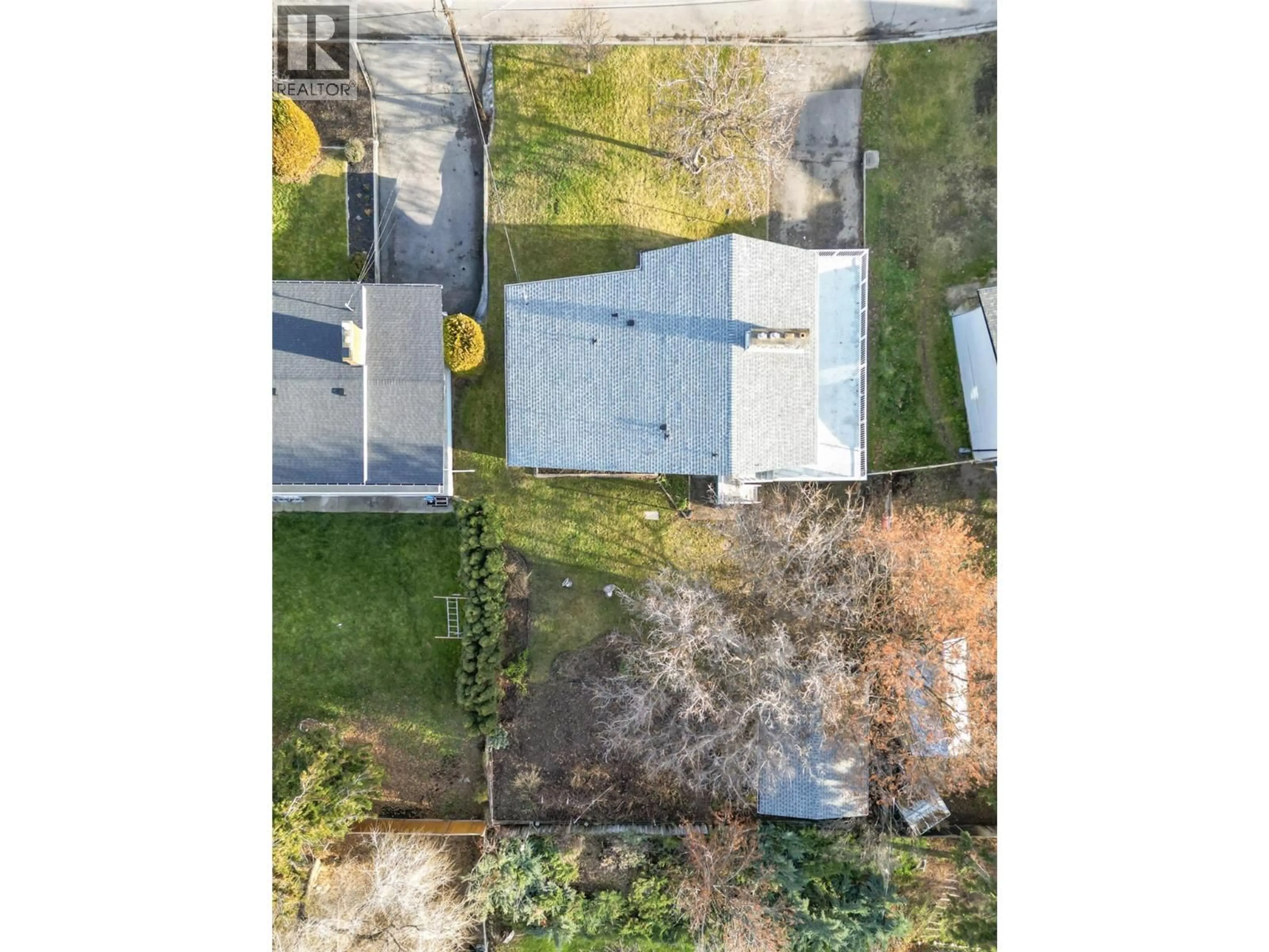 A pic from outside/outdoor area/front of a property/back of a property/a pic from drone, street for 840 MATT ROAD, Kelowna British Columbia V1X3W3