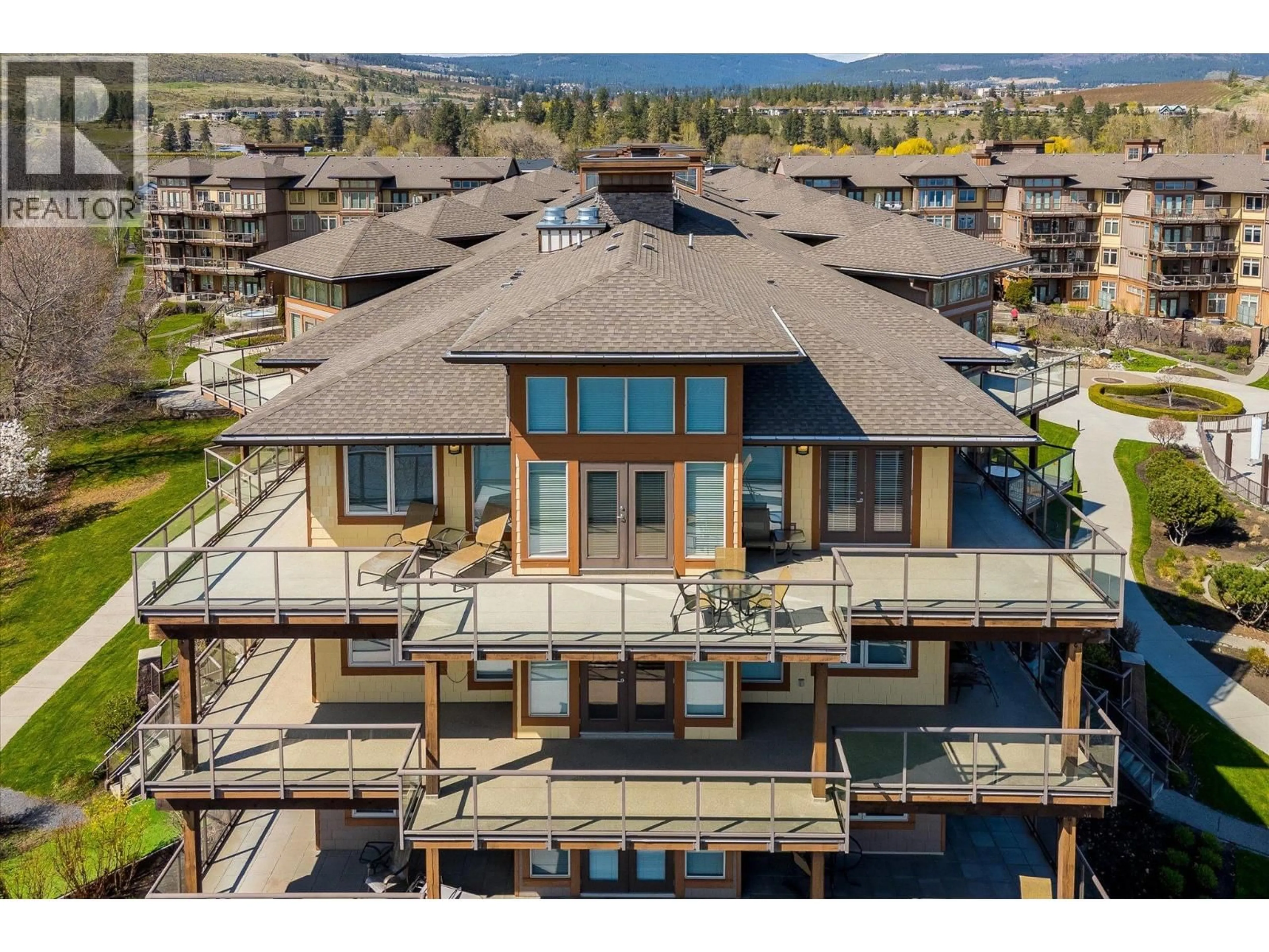 A pic from outside/outdoor area/front of a property/back of a property/a pic from drone, water/lake/river/ocean view for 424 - 4205 GELLATLY ROAD, West Kelowna British Columbia V4T2K2