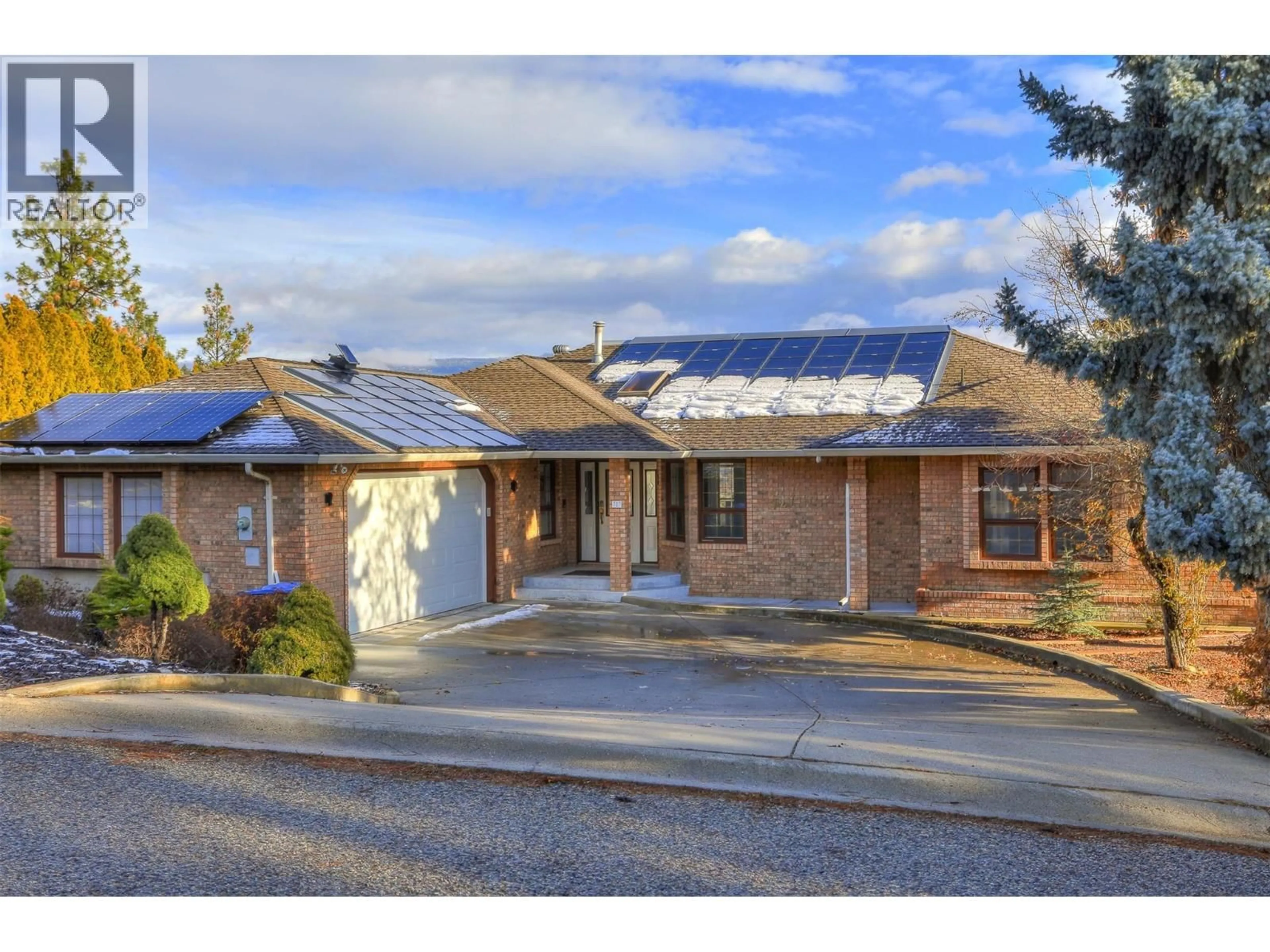 Home with brick exterior material, street for 727 CASSIAR CRESCENT, Kelowna British Columbia V1V1M7