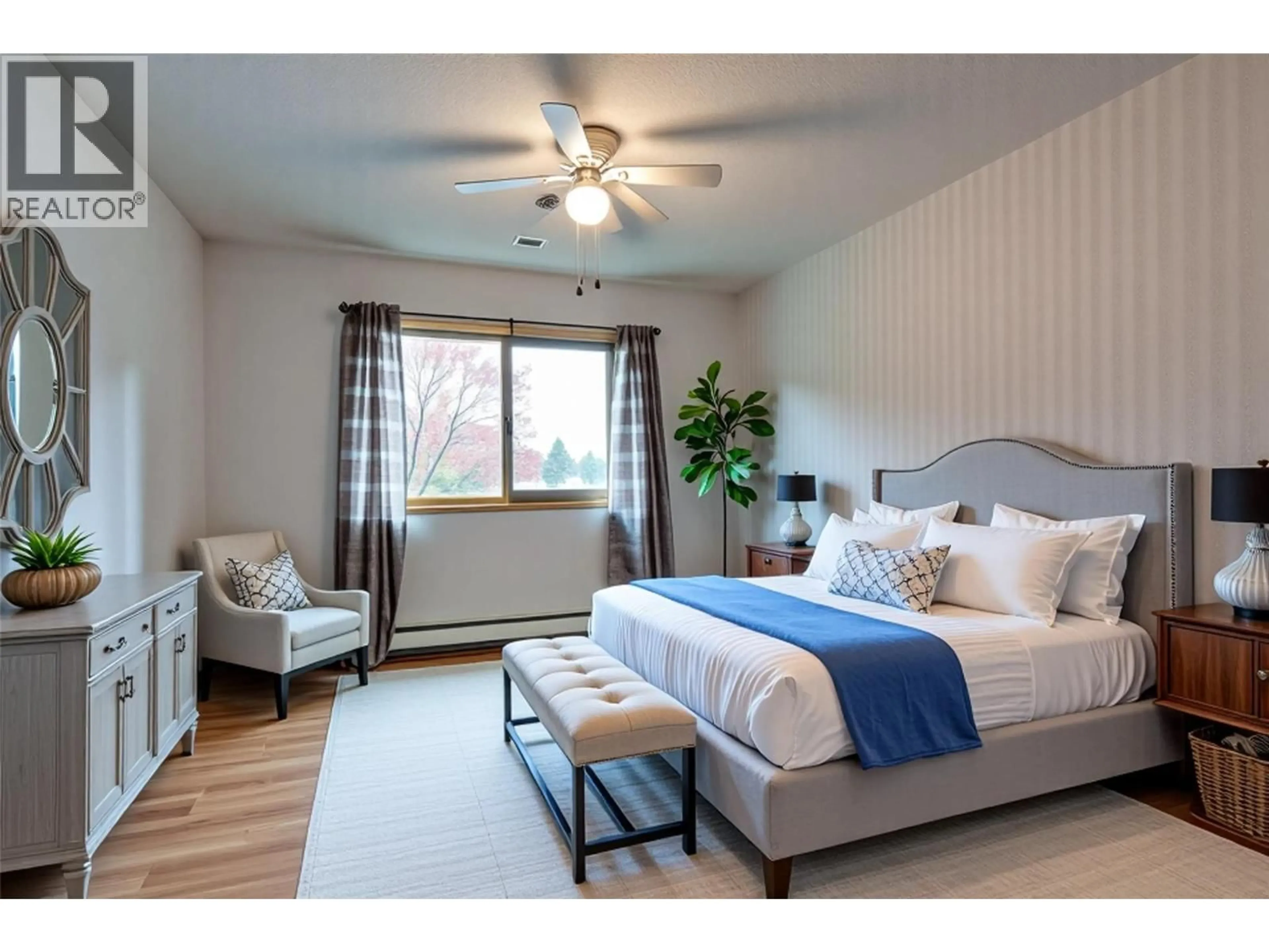 Bedroom with bed, wood/laminate floor for 314 - 2110 HOY STREET, Kelowna British Columbia V1Y8T4