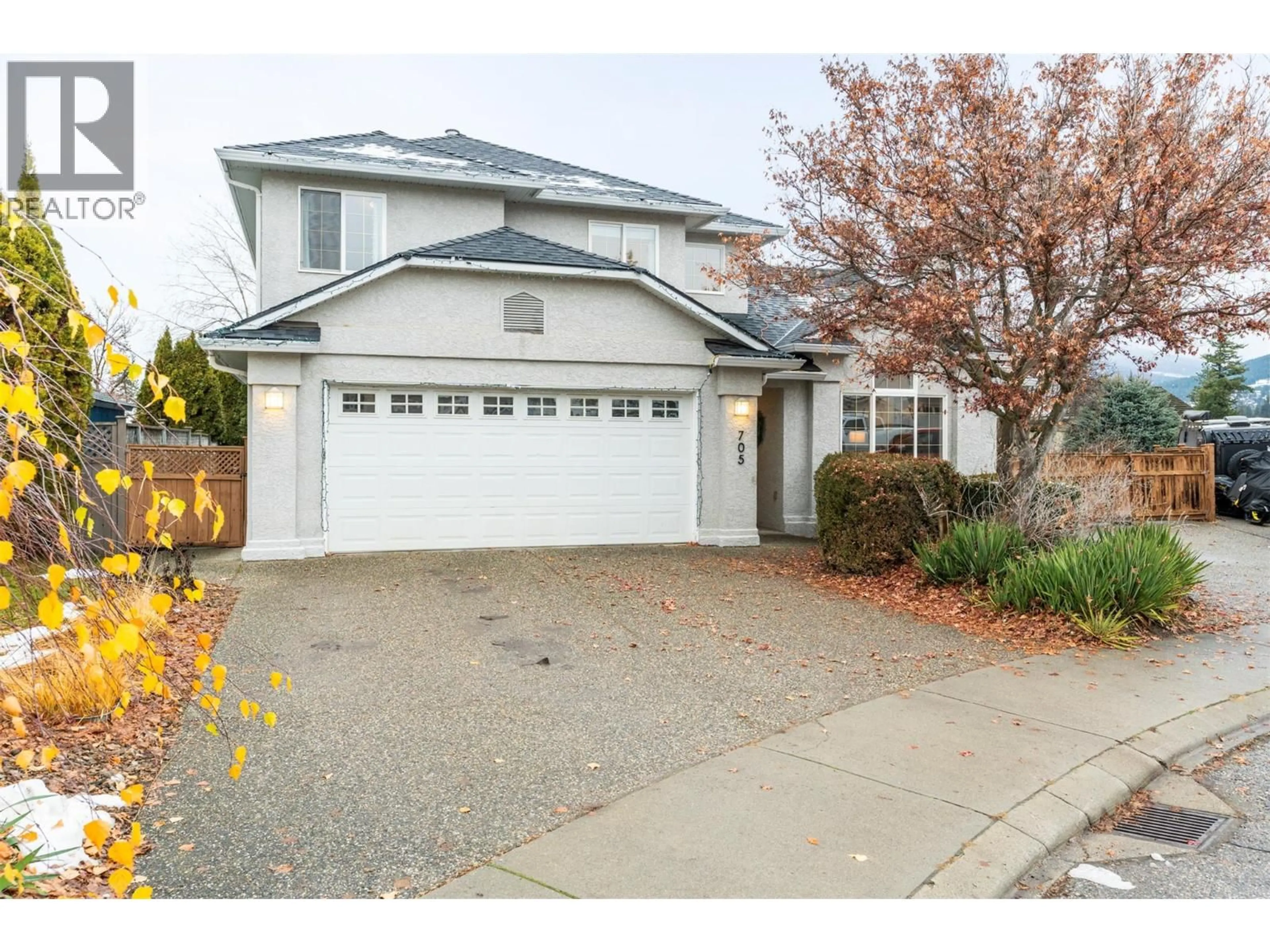 Home with vinyl exterior material, street for 705 CAVALIER COURT, Vernon British Columbia V1T9M6