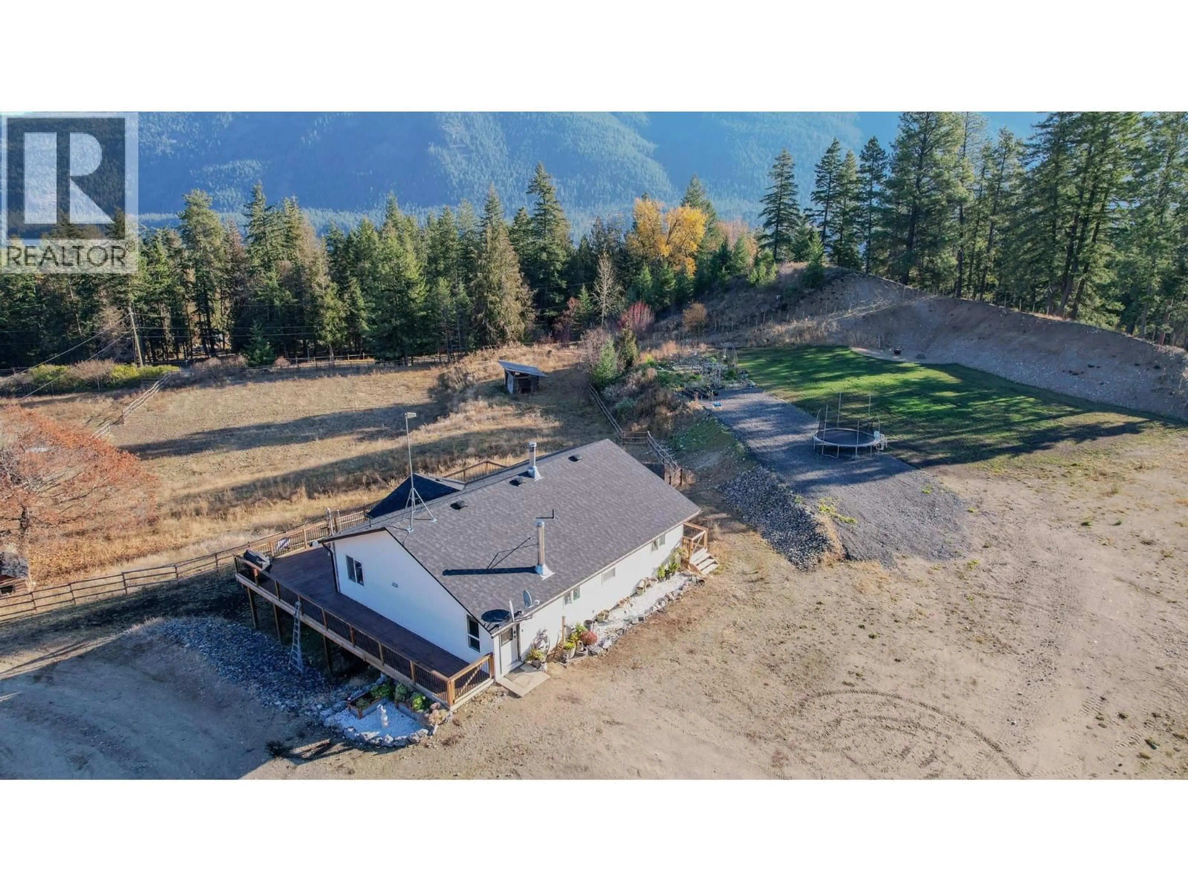 A pic from outside/outdoor area/front of a property/back of a property/a pic from drone, water/lake/river/ocean view for 2086 YANKEE FLATS ROAD, Salmon Arm British Columbia V1E3J3