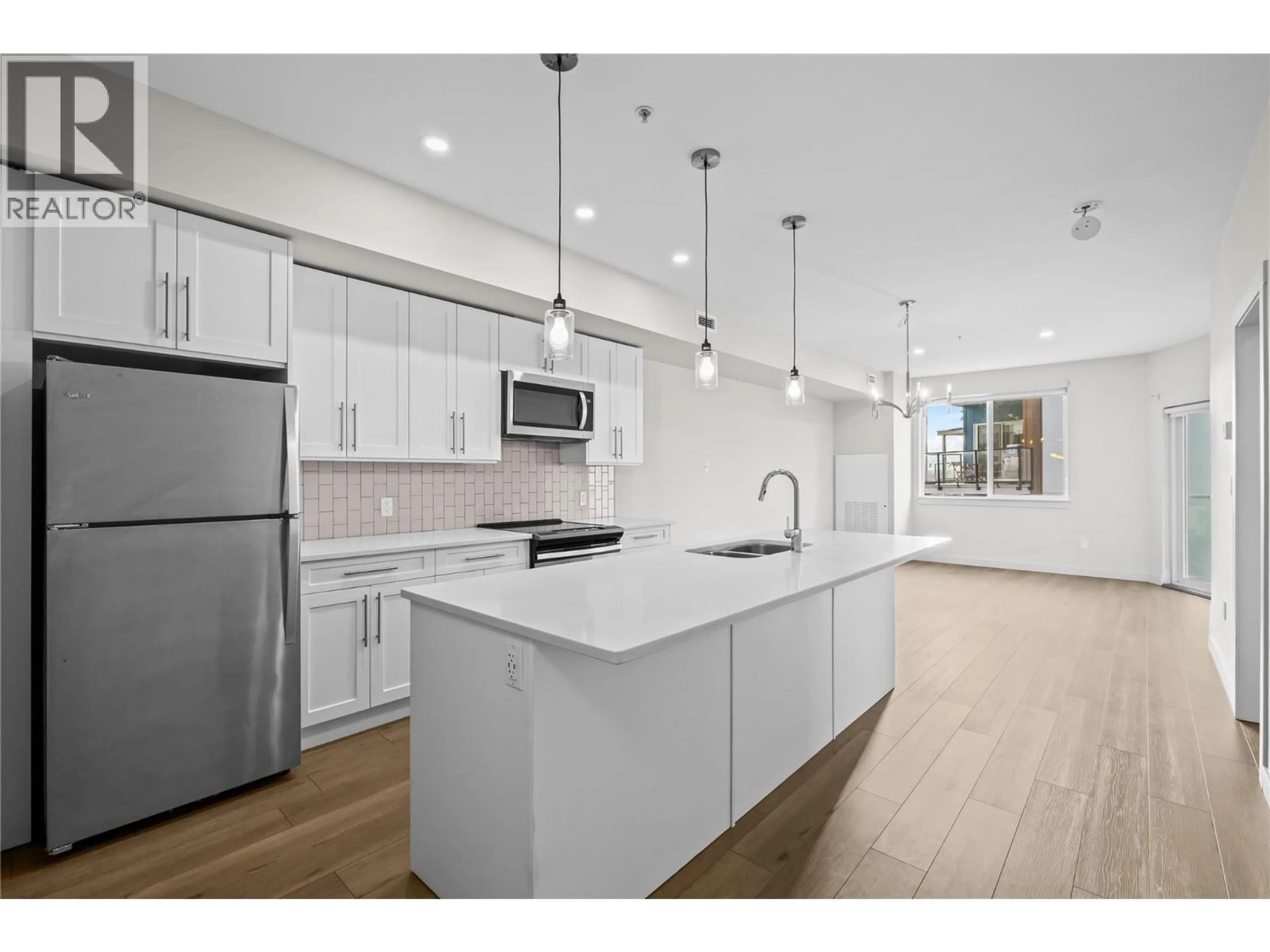 Open concept kitchen, unknown for 406 - 3638 MISSION SPRINGS DRIVE, Kelowna British Columbia V1W0B3