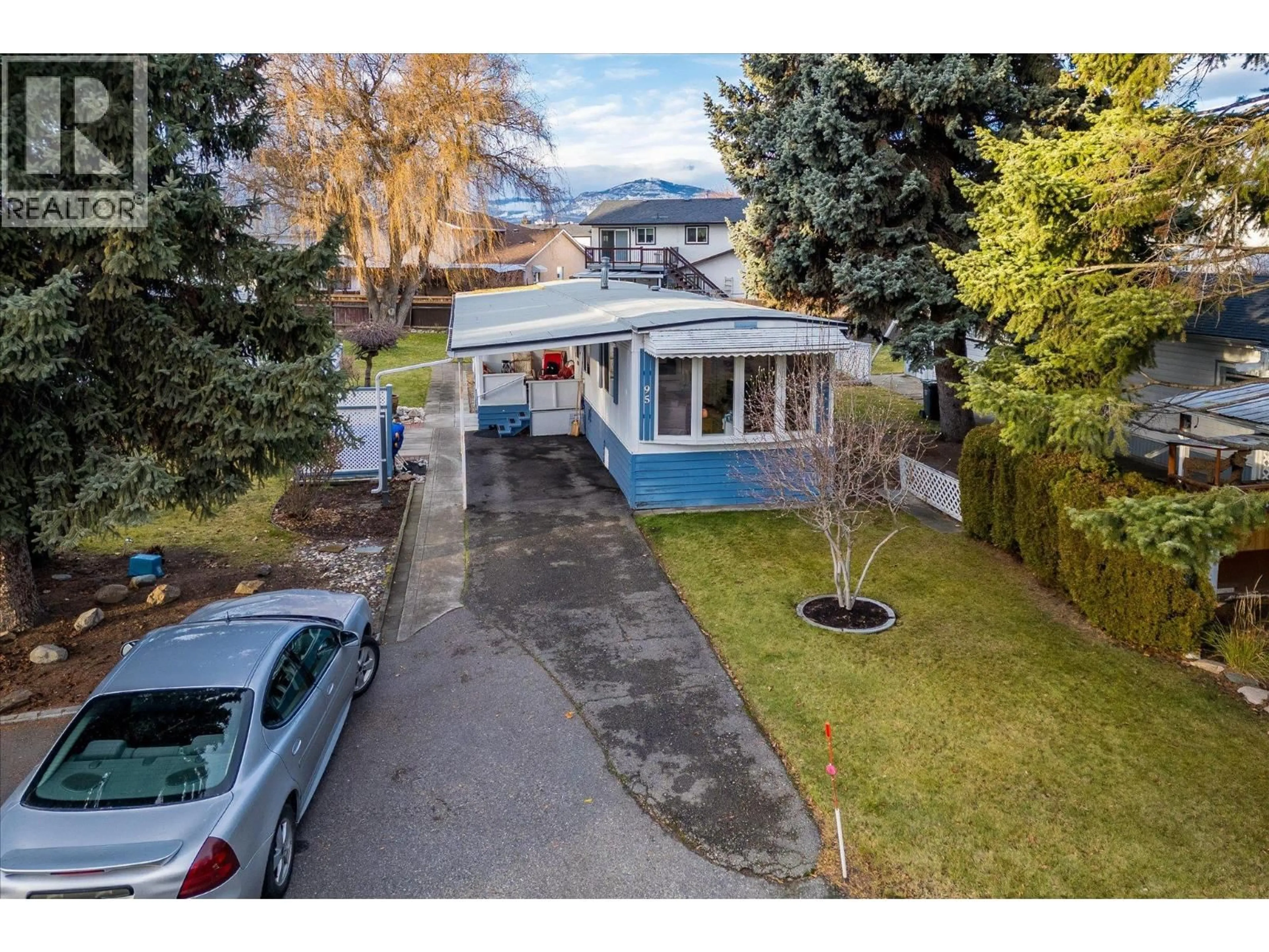 A pic from outside/outdoor area/front of a property/back of a property/a pic from drone, street for 95 - 3535 CASORSO ROAD, Kelowna British Columbia V1W3E1
