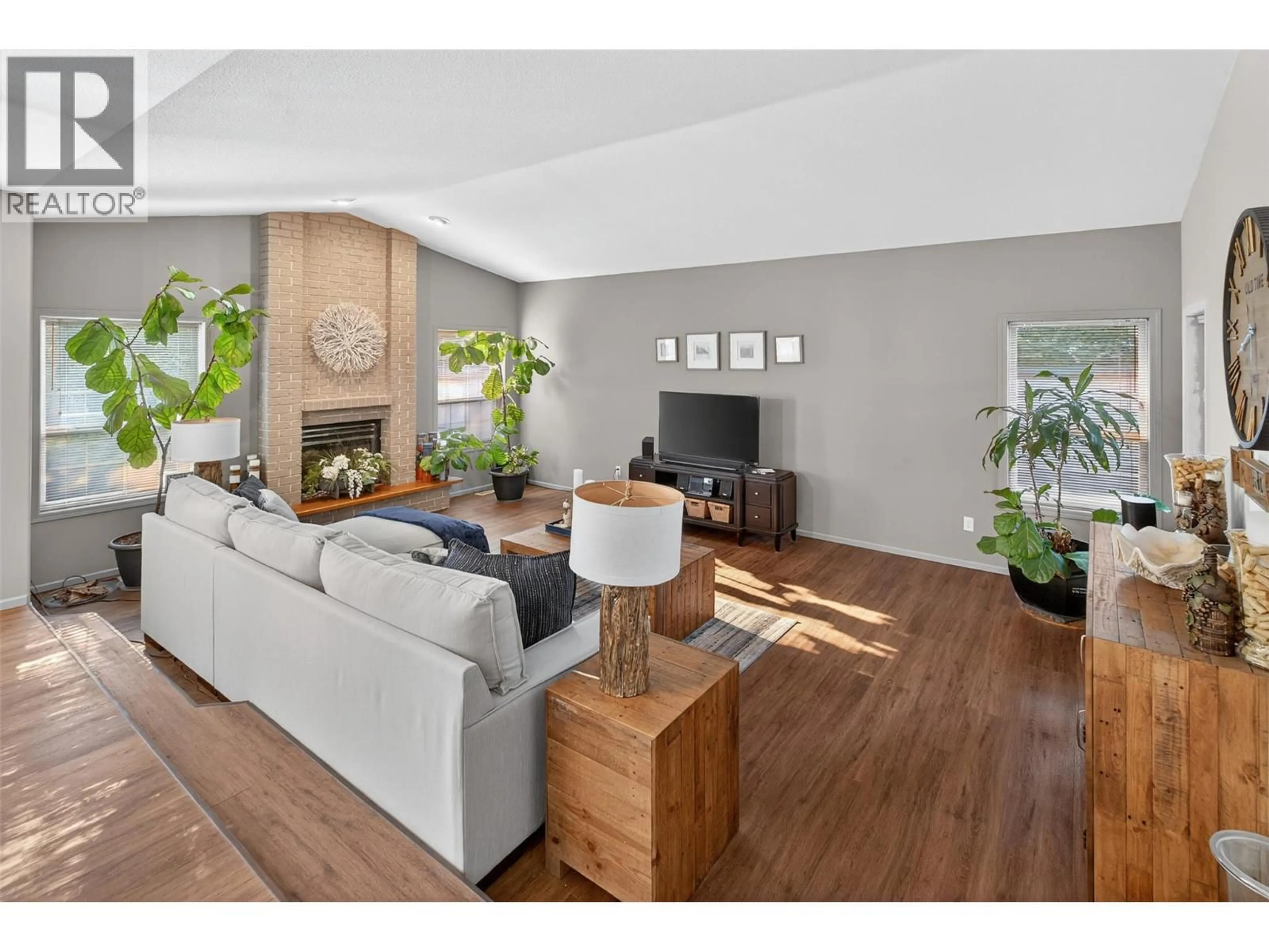 Living room with furniture, wood/laminate floor for 407 - 2330 BUTT ROAD, West Kelowna British Columbia V4T2L3