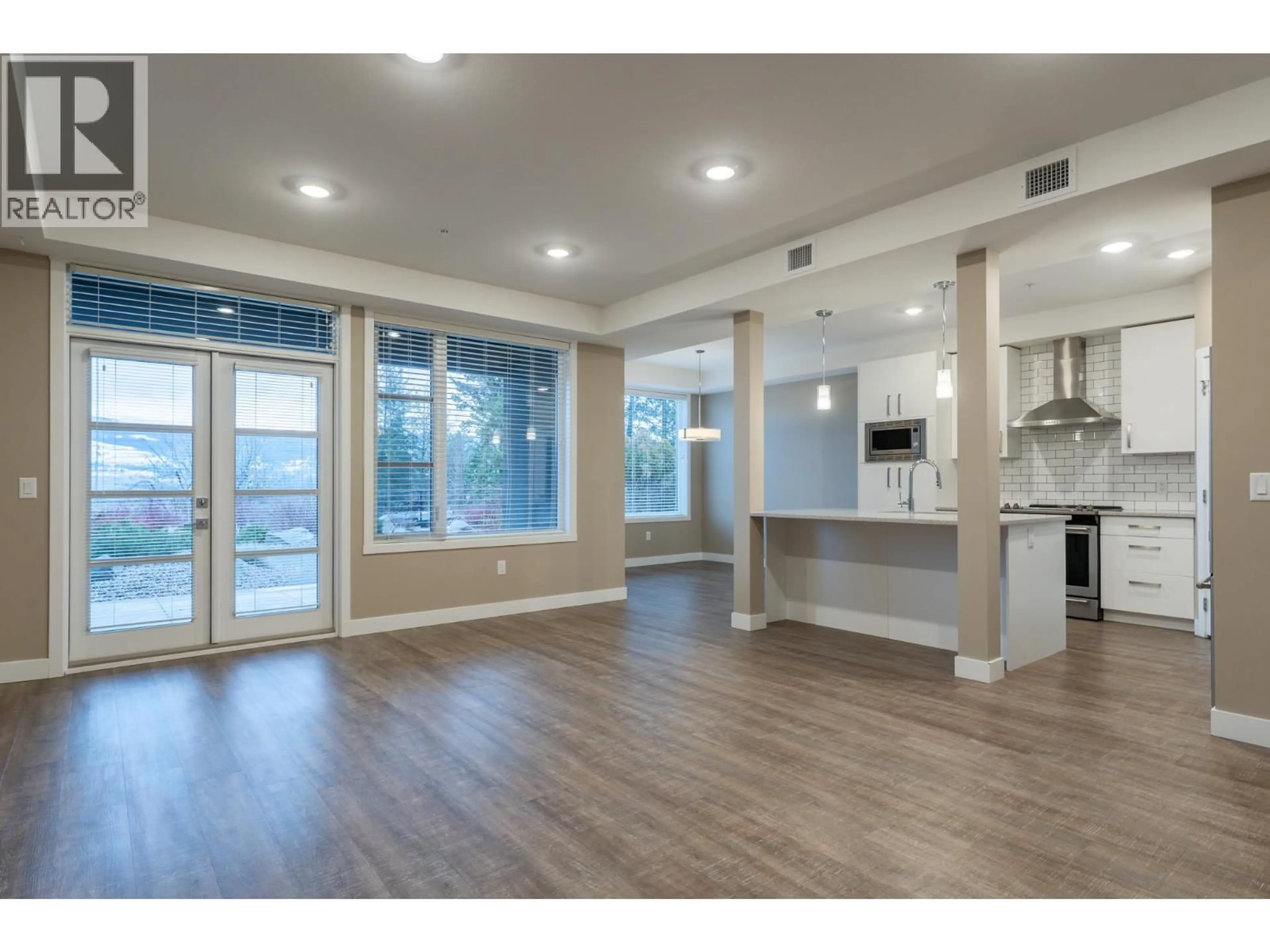 Open concept kitchen, wood/laminate floor for 5 - 9700 SANTINA ROAD, Lake Country British Columbia V4V0B1