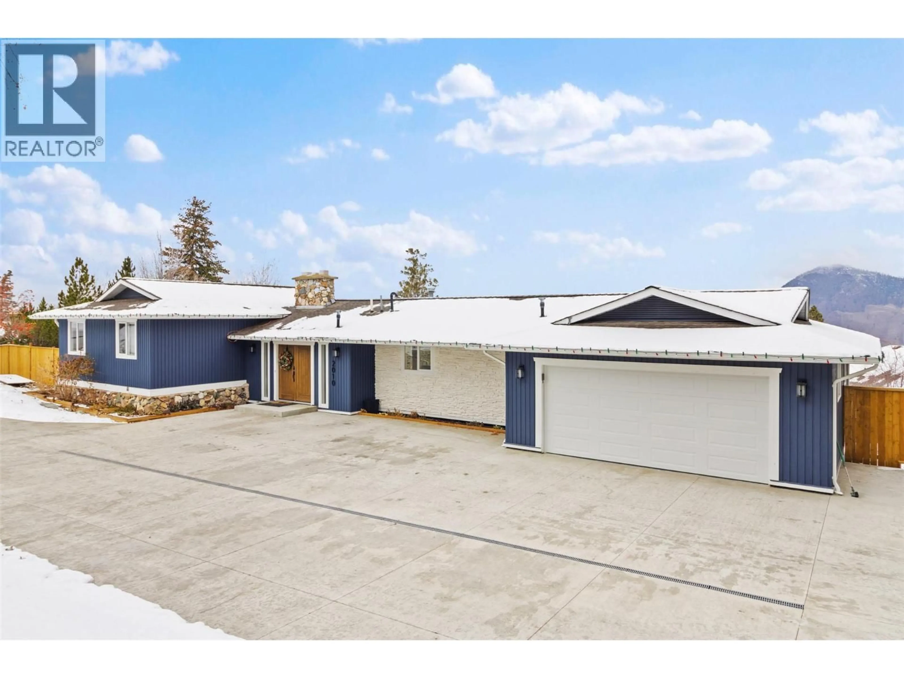 A pic from outside/outdoor area/front of a property/back of a property/a pic from drone, street for 2010 HIGH COUNTRY BOULEVARD, Kamloops British Columbia V2E1L1