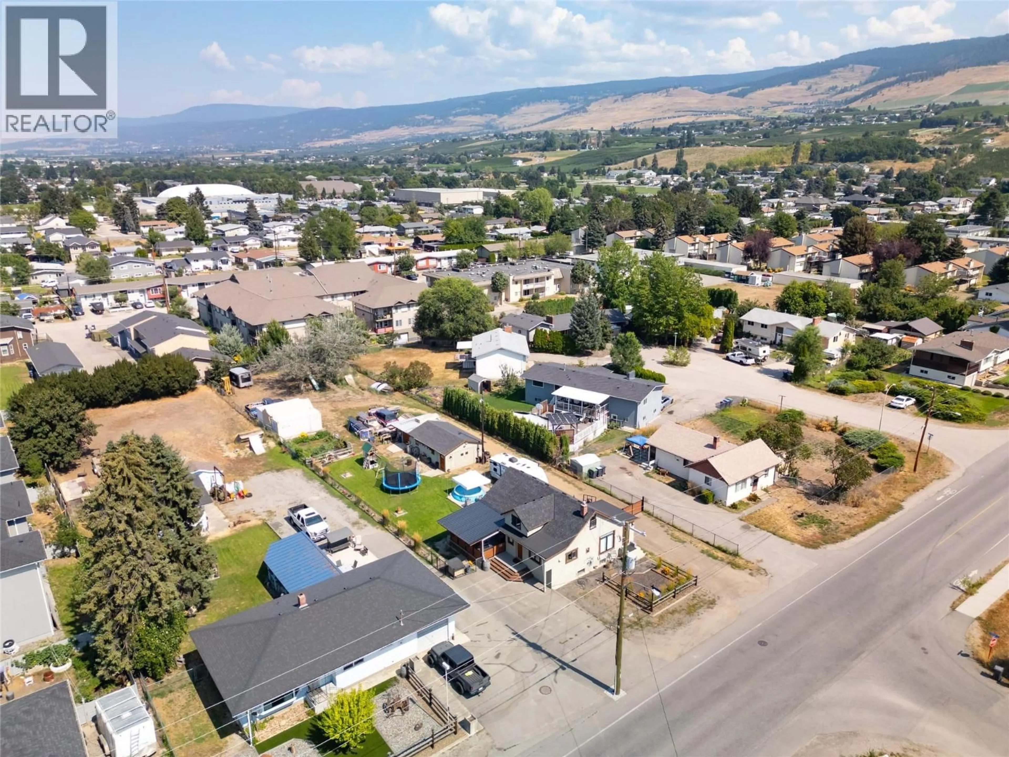 A pic from outside/outdoor area/front of a property/back of a property/a pic from drone, mountain view for 170 MUGFORD ROAD, Kelowna British Columbia V1X2E2