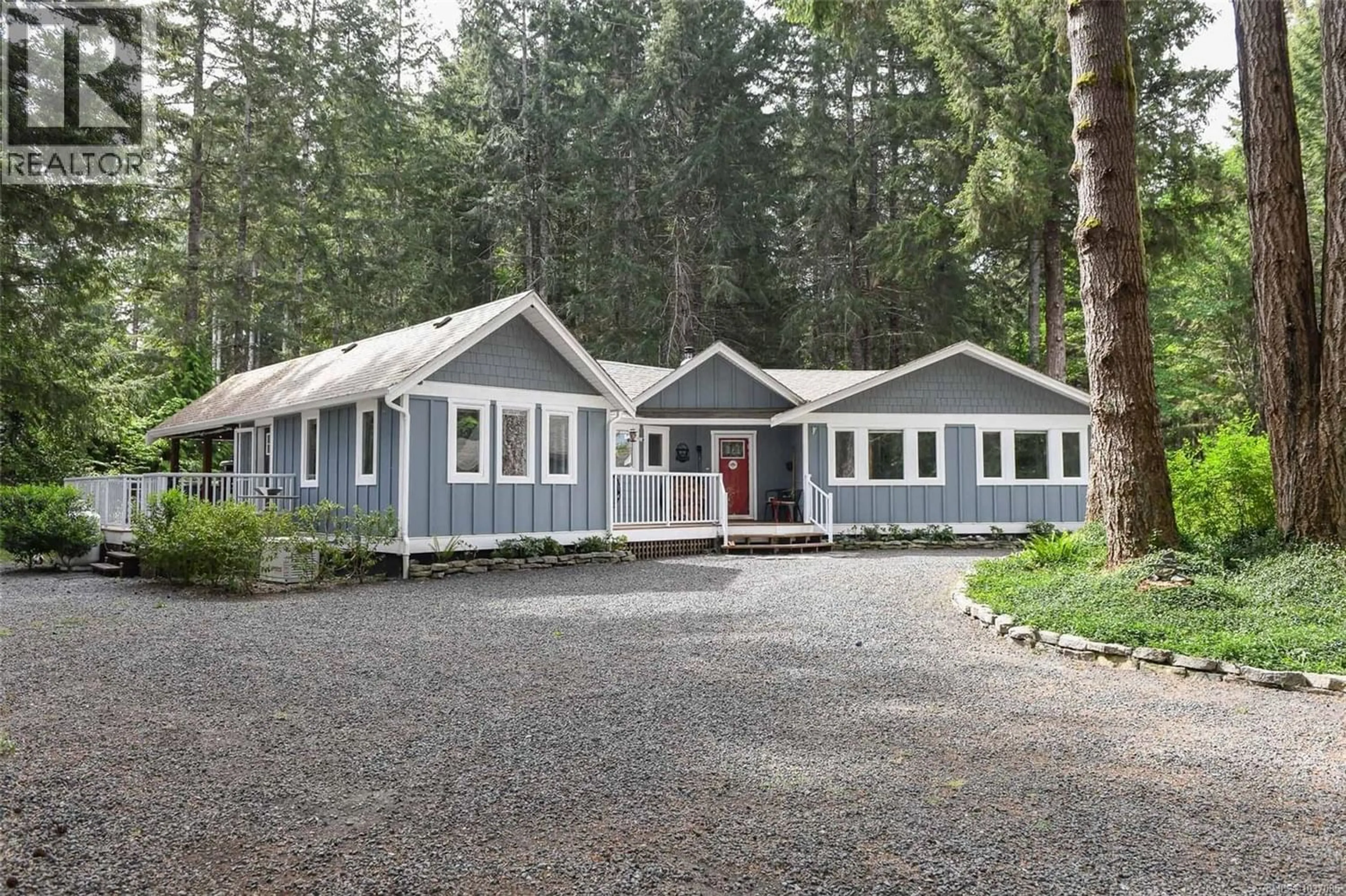 Home with vinyl exterior material, street for 325 BATES DRIVE, Fanny Bay British Columbia V0R1W0