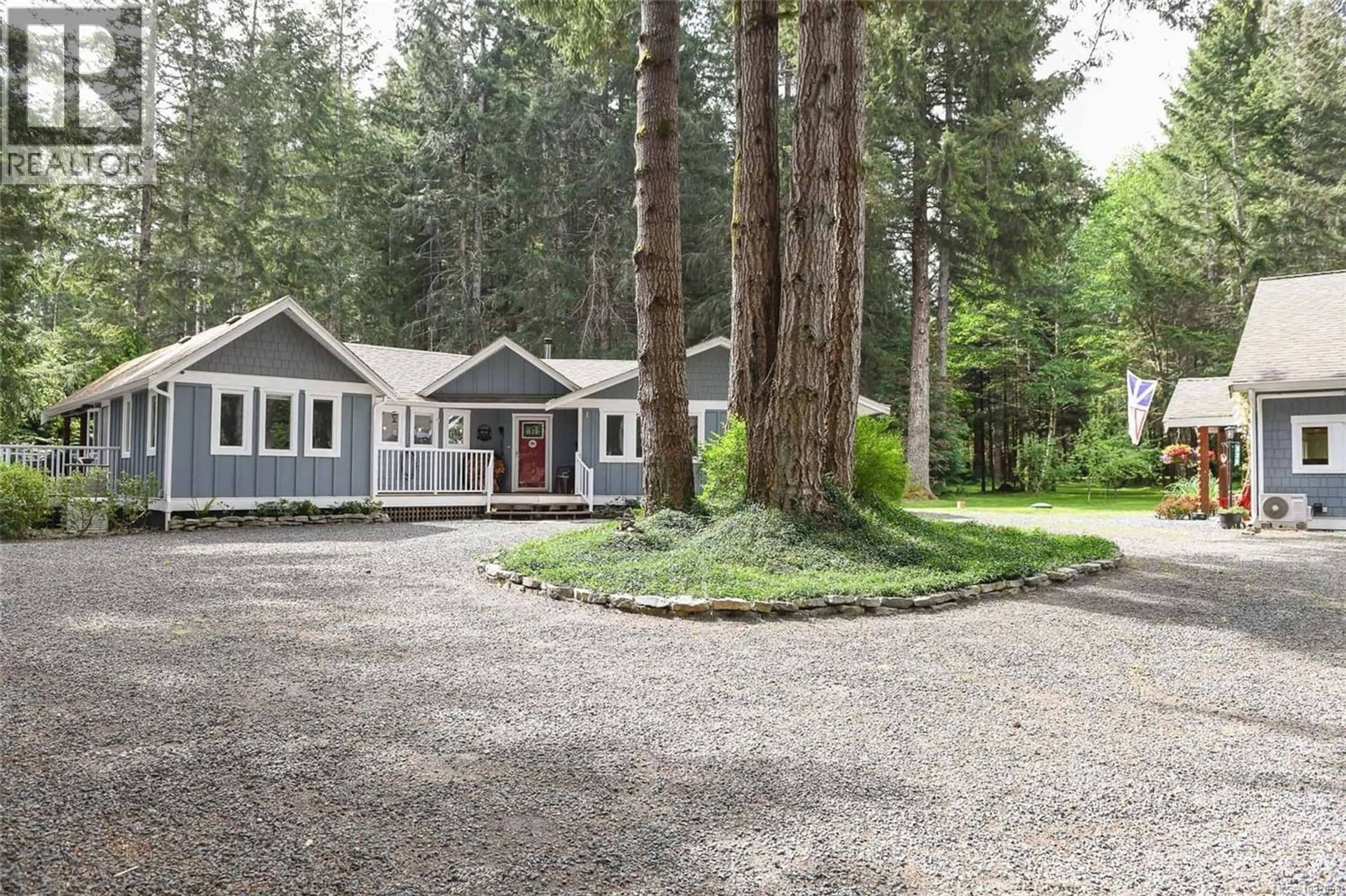 Home with vinyl exterior material, street for 325 BATES DRIVE, Fanny Bay British Columbia V0R1W0