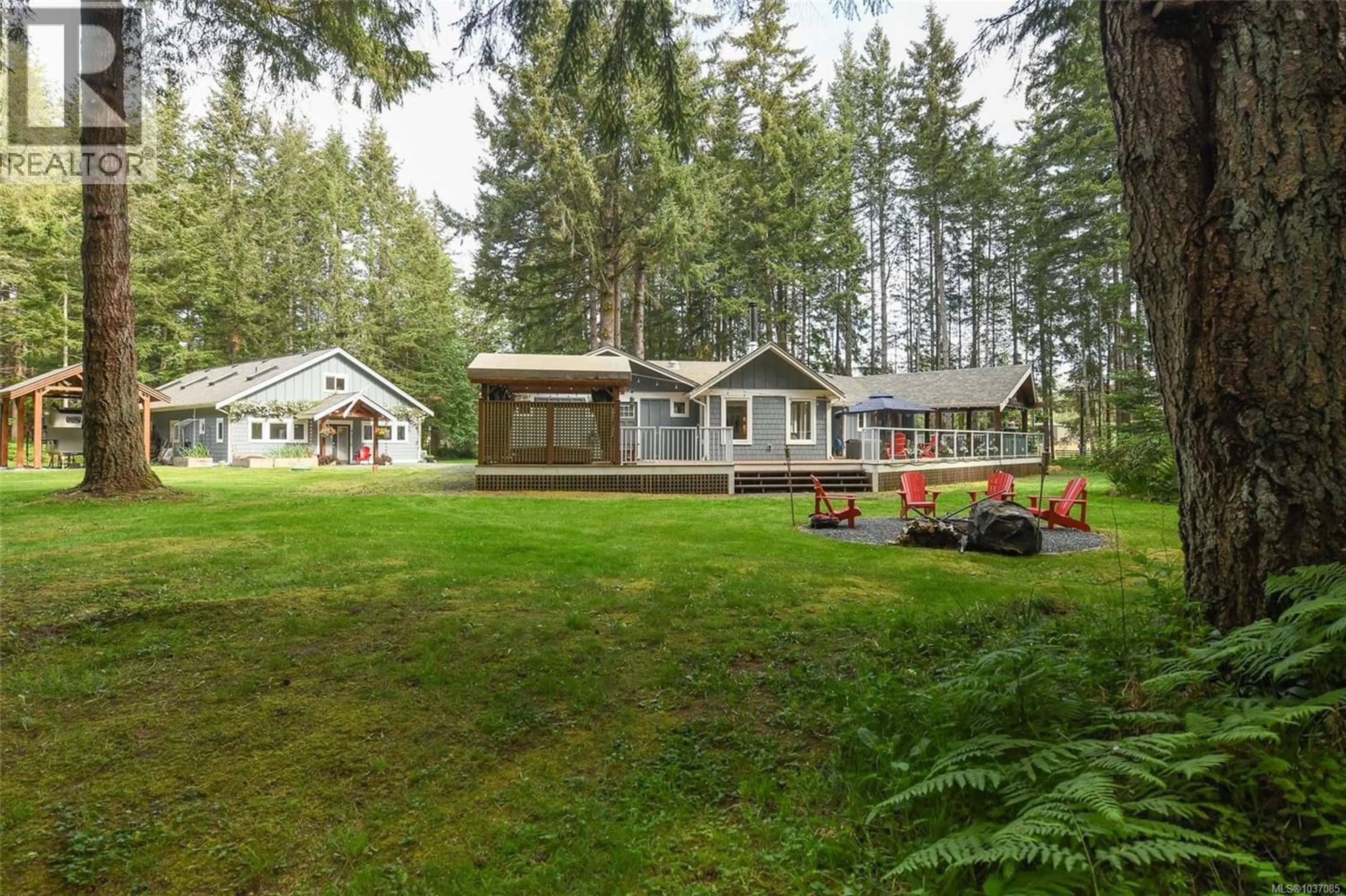 A pic from outside/outdoor area/front of a property/back of a property/a pic from drone, forest/trees view for 325 BATES DRIVE, Fanny Bay British Columbia V0R1W0