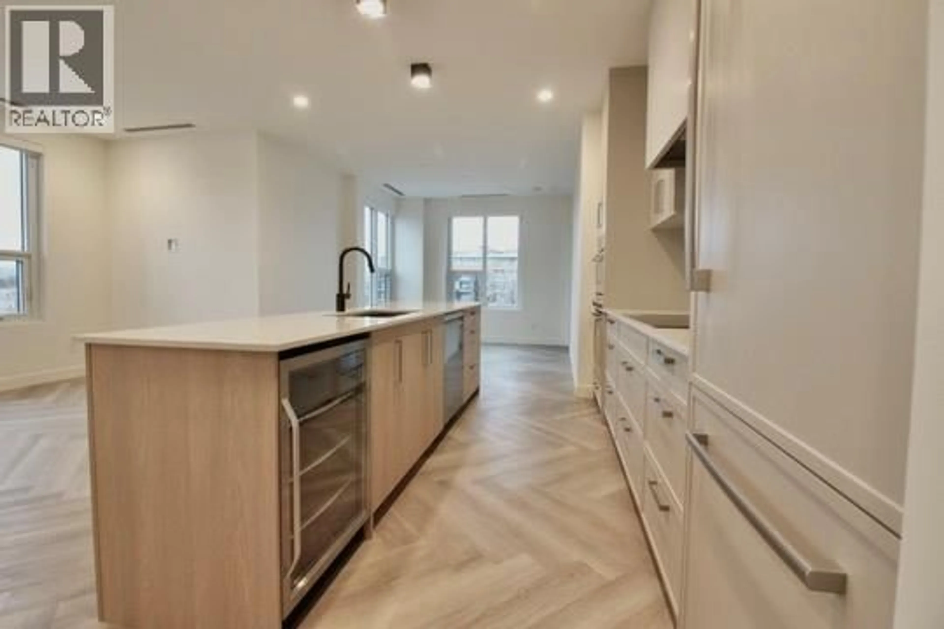 Open concept kitchen, unknown for 411 - 3340 LAKESHORE ROAD, Kelowna British Columbia V1W0H6