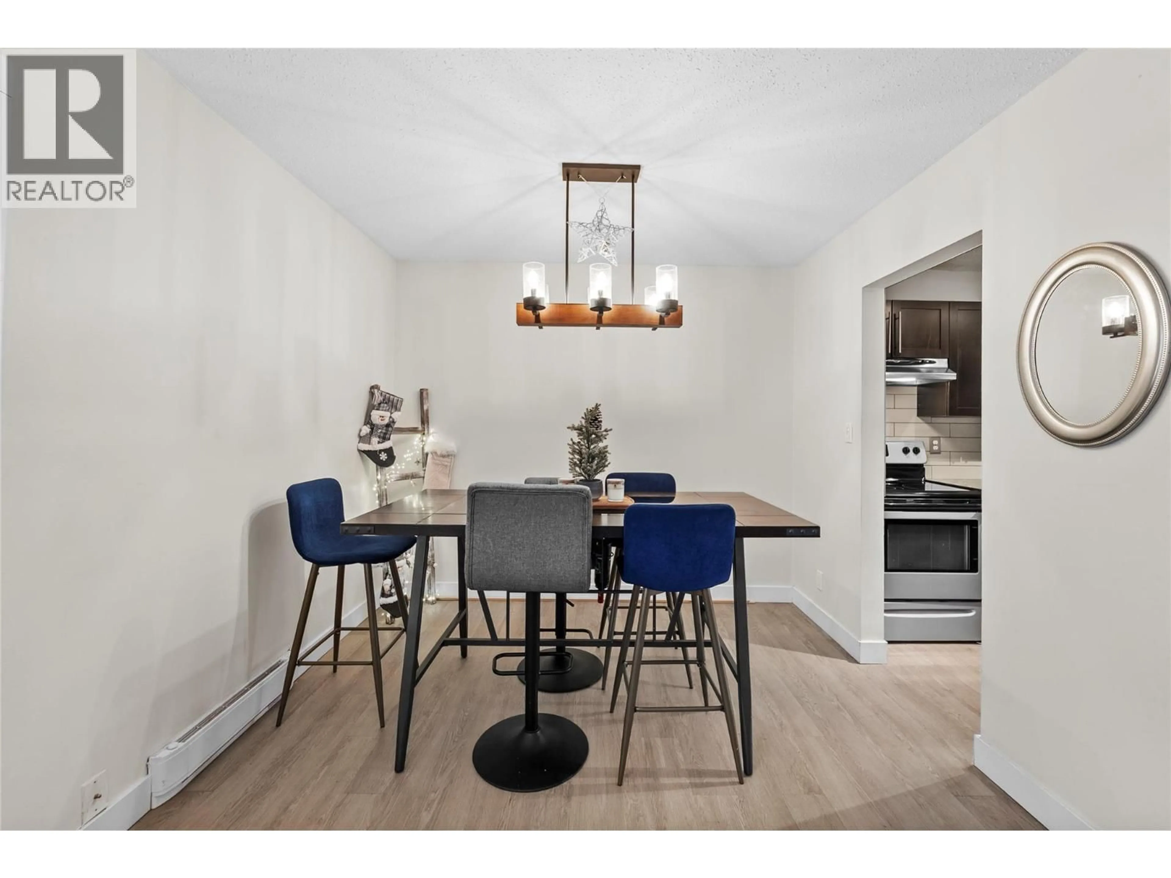Dining room, wood/laminate floor for 24 - 700 COLLINGWOOD DRIVE, Kamloops British Columbia V2B6B9