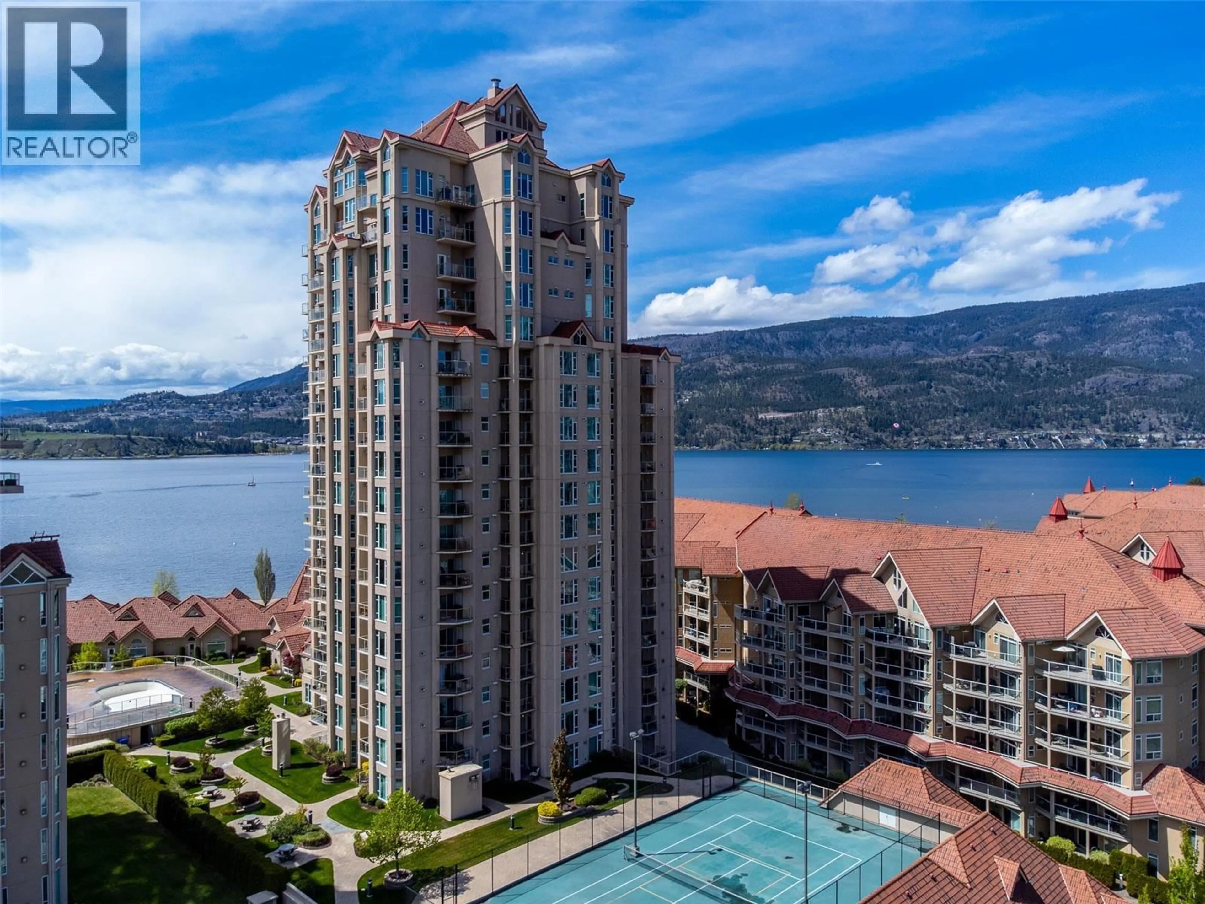 A pic from outside/outdoor area/front of a property/back of a property/a pic from drone, water/lake/river/ocean view for 401 - 1128 SUNSET DRIVE, Kelowna British Columbia V1Y9W7