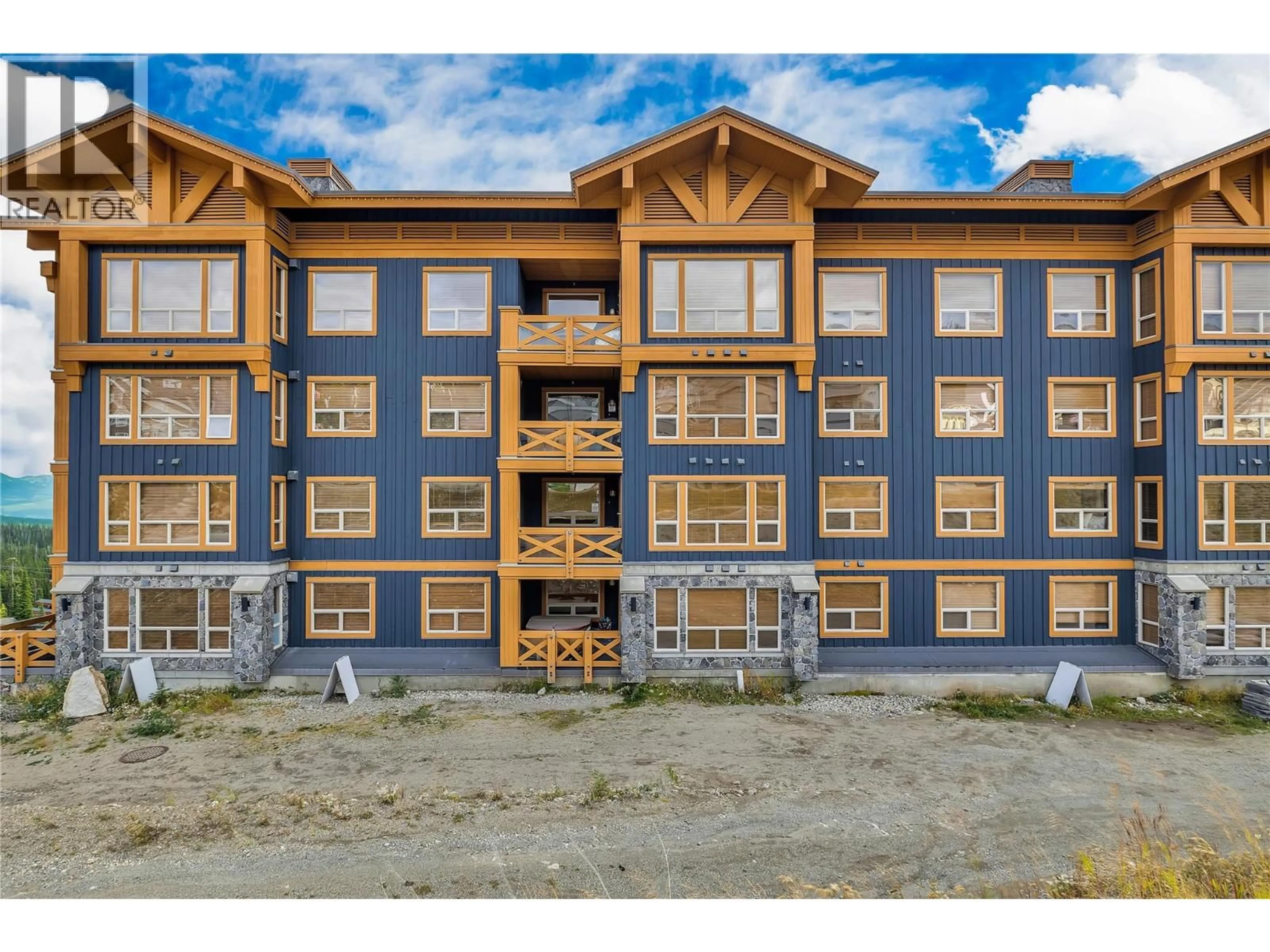 A pic from outside/outdoor area/front of a property/back of a property/a pic from drone, building for 101 - 5300 BIG WHITE ROAD, Big White British Columbia V1P1P3